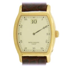 Patek Philippe Rose Gold Tonneau-Shape Anniversary Jump Hour Wristwatch