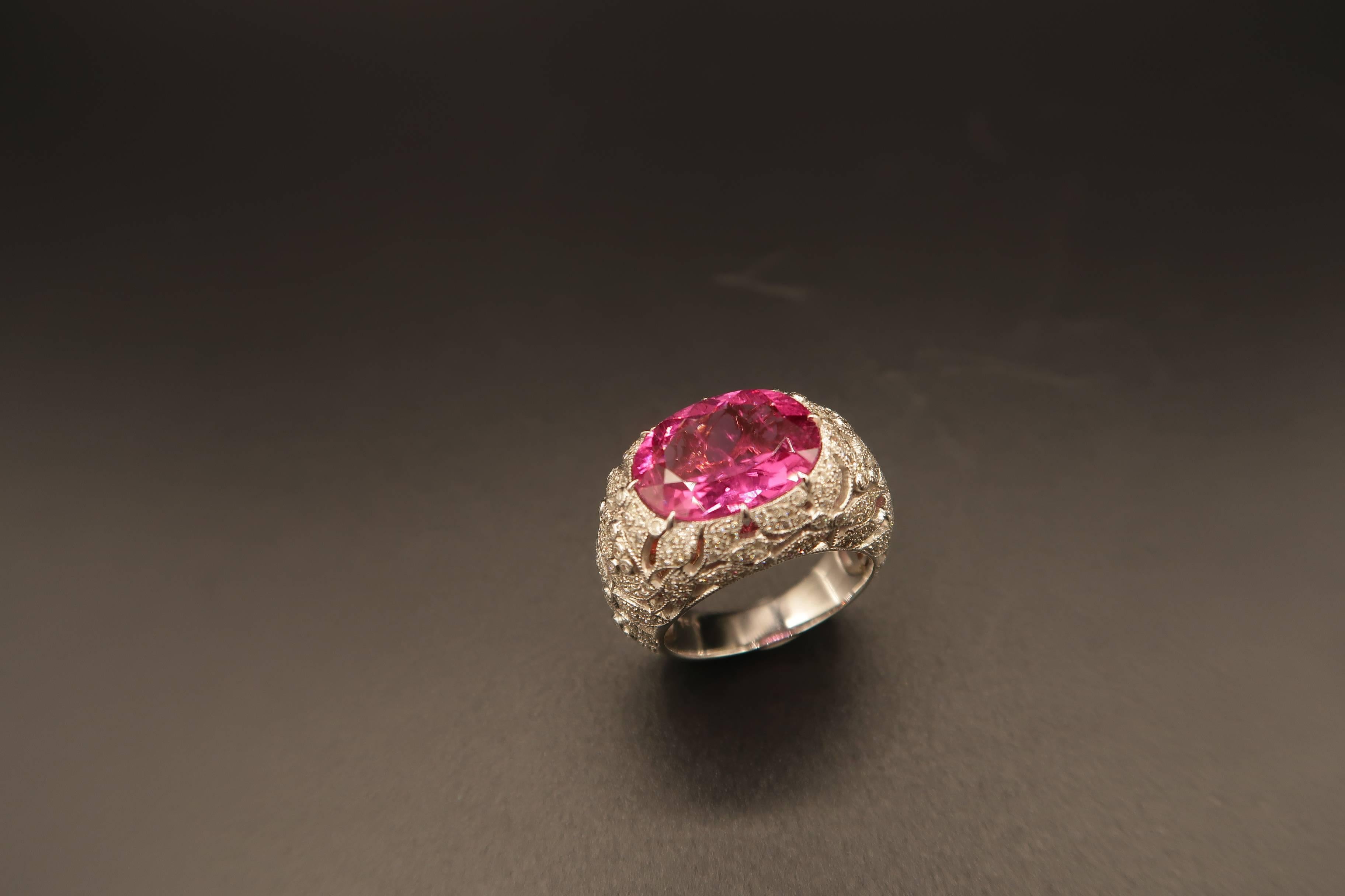 Pink Tourmaline Ring with Diamond Lacework in 18K White Gold
Gold : 11g. 18K White Gold
Diamond : 1.06ct. 
Pink Tourmaline: 5.56cts.

