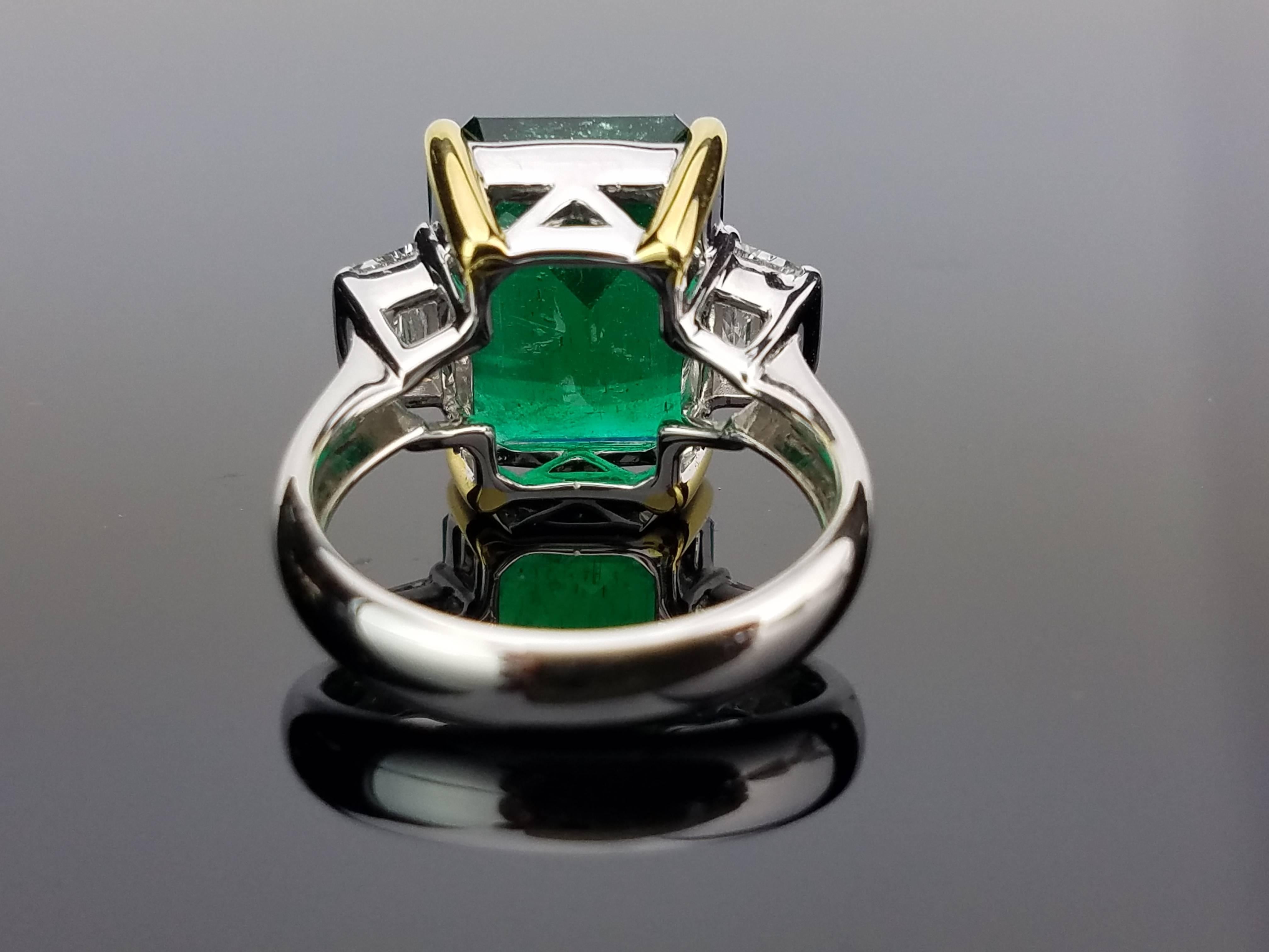 emerald with side stones