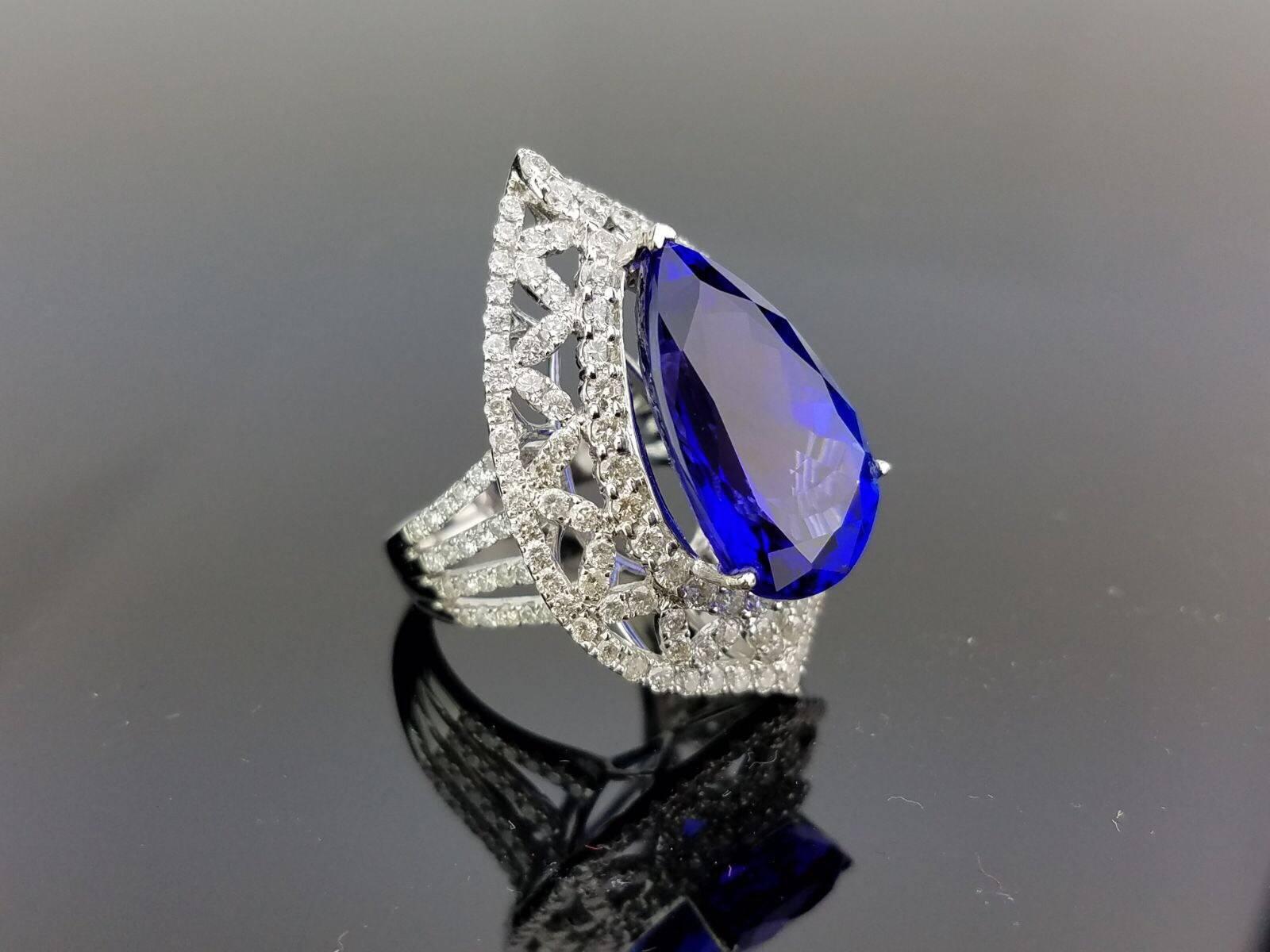Statement Pear Shape Tanzanite and Diamond Ring on 18K White Gold band

Centre Stone Details:  
Stone: Tanzanite
Cut: Pear 
Weight: 13.51 carat

Diamond Details:
Cut: Brilliant (round) 
Total Carat Weight: 2.36 carat 
Quality: VS/SI , H/I 

18K