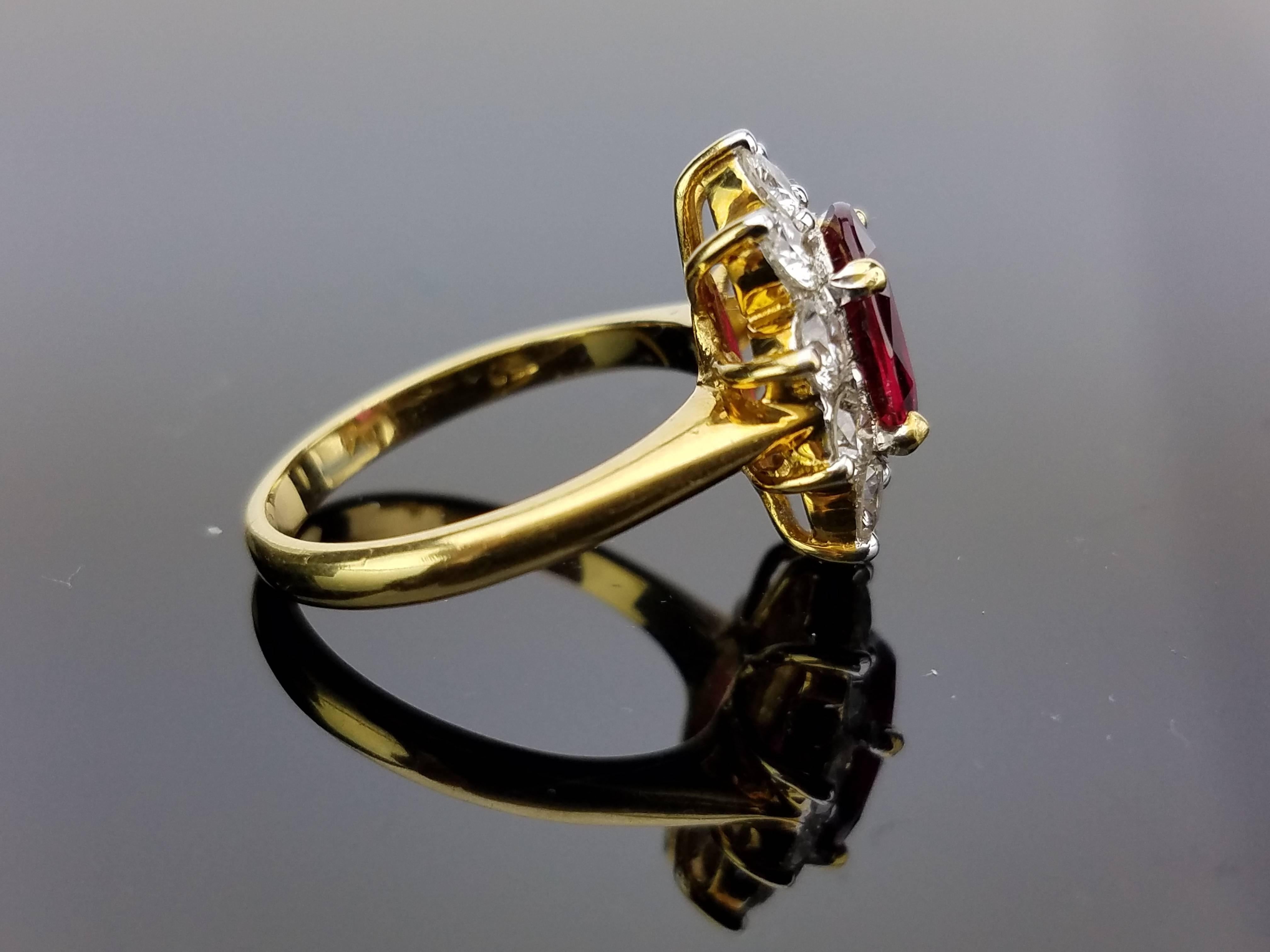 Beautiful Mozambique Ruby with DIamonds set in 18K yellow Gold. 

Stone Details: 
Stone: Mozambique Ruby
Cut: Oval
Carat Weight: 3 Carat

Diamond Details:
Cut: Brilliant cut
Total Carat Weight: 0.91 carat
Quality: VS/SI , H/I

18K Gold: 5.15 grams