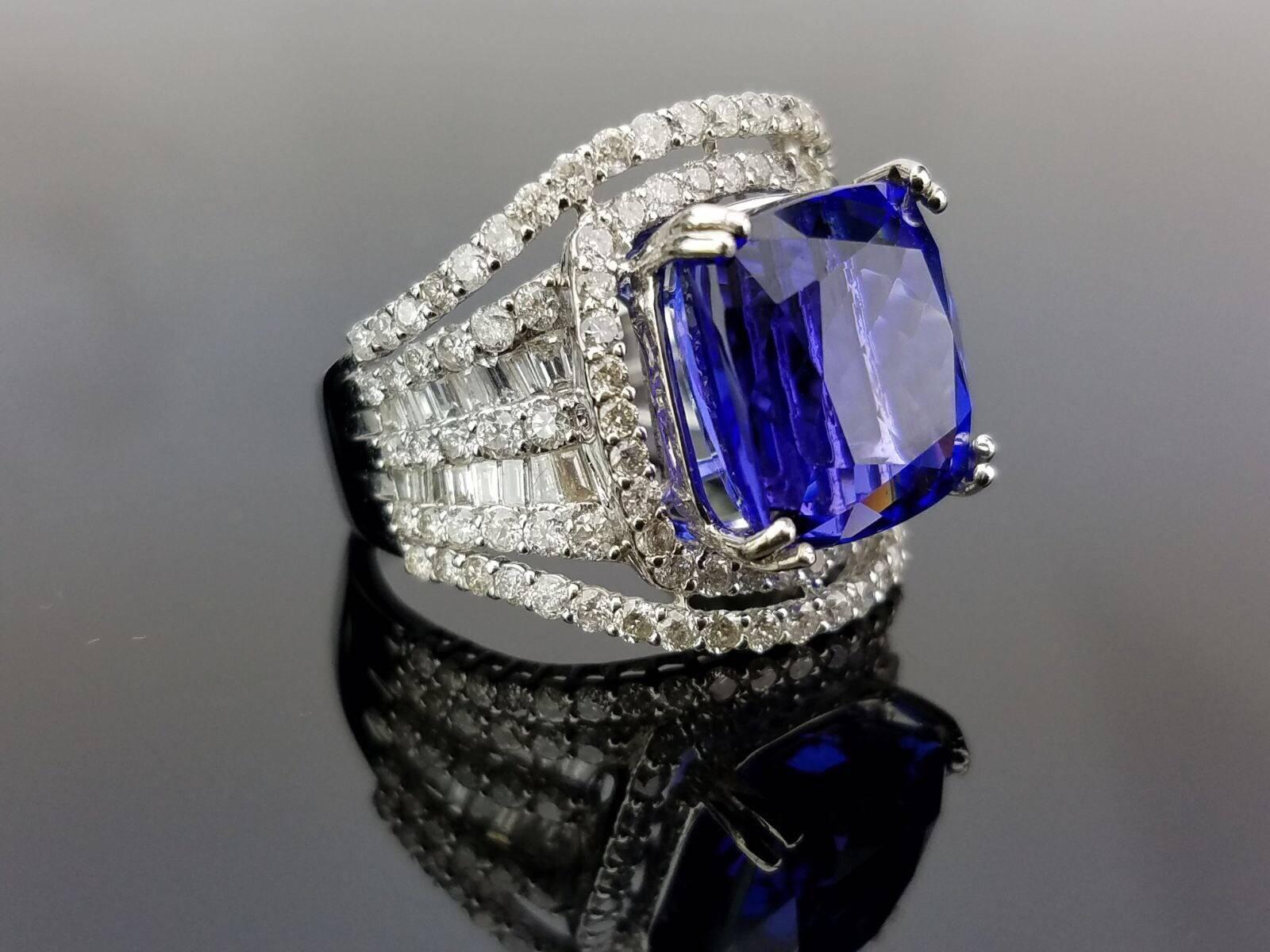 A statement cocktail ring, with a clean Tanzanite (without any inclusions) and white Diamonds all set in 18K white Gold. Currently sized US 6.5, but can be altered without any additional charges.
Please message us for more information!

Stone