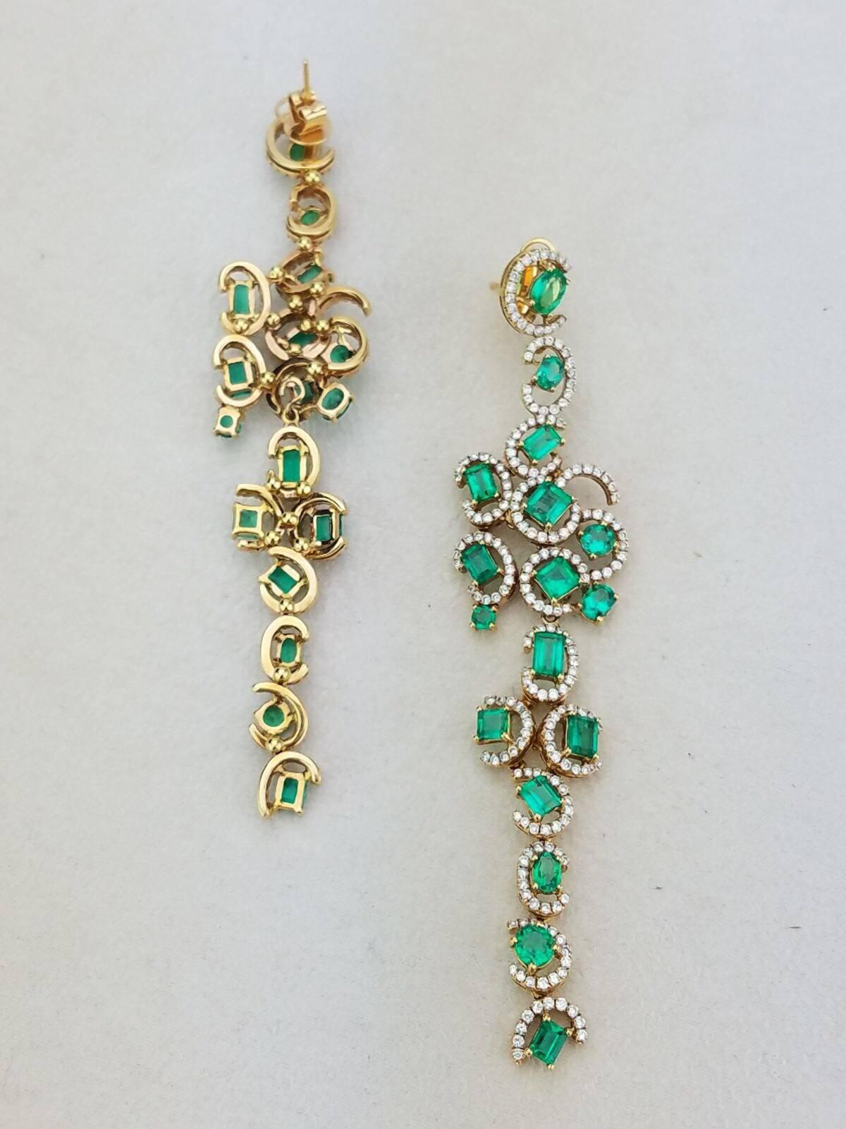 Beautiful, dressy Colombian Emerald and Diamond earrings all set in 18K yellow Gold.

Stone Details:  
Stone: Colombian Emerald
Cut: Mix 
Carat Weight: 8.95 Carat  

Diamond Details: 
Cut: Brilliant cut
Total Carat Weight: 4.00 carat 
Quality: VS/SI