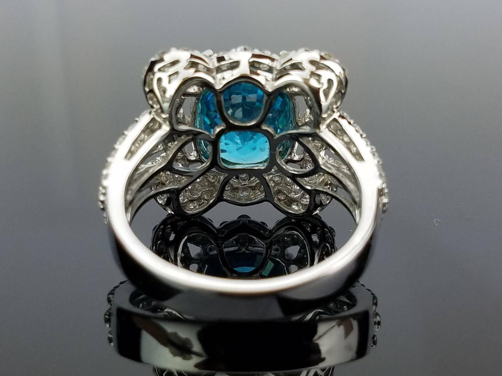 Modern Oval Blue Zircon and Diamond 18 Karat White Gold Cocktail Ring For Sale