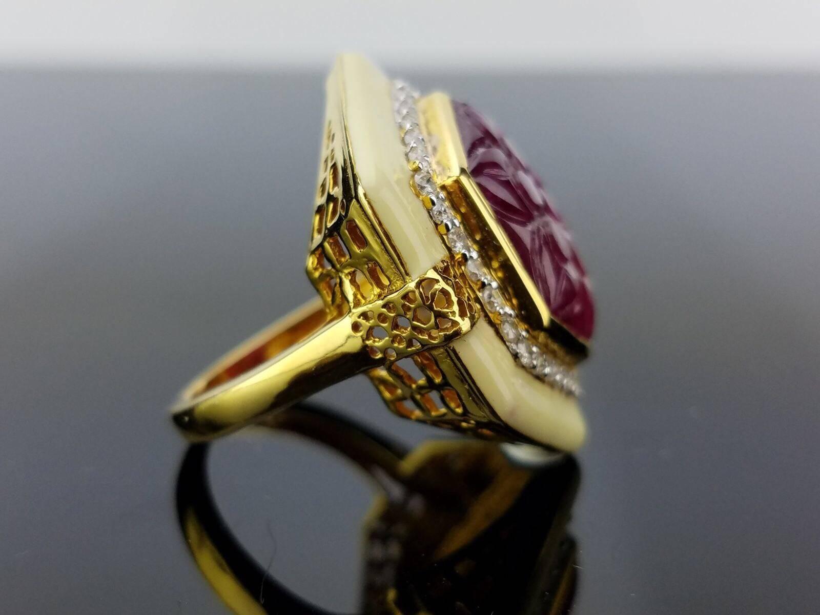 Art Deco Carved 11 carat Ruby and White Enamel 18K Gold Cocktail Ring