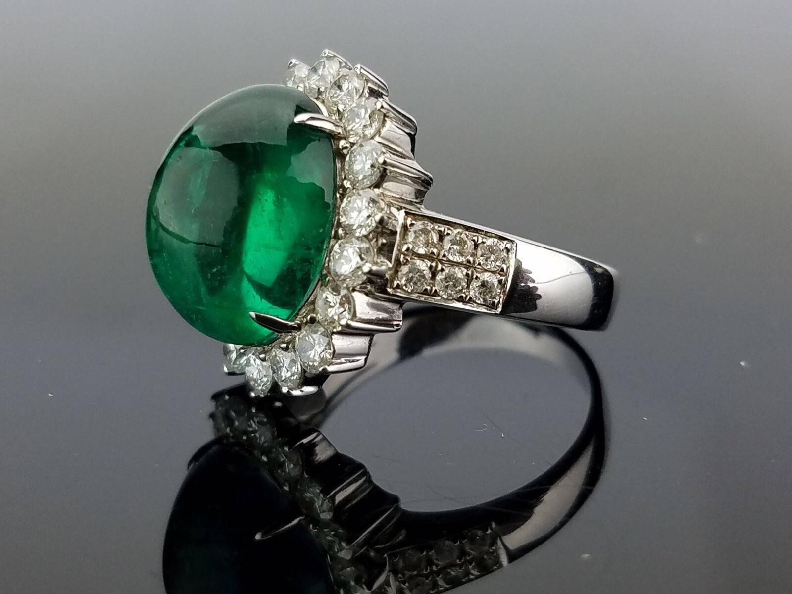 A very elegant Zambian Emerald cabochon of good quality and beautiful colour, and White Diamond cocktail ring, all set 18K white gold. 

Stone Details: 
Stone: Zambian Emerald
Carat Weight: 8.35 Carat

Diamond Details:
Total Carat Weight: 1.43