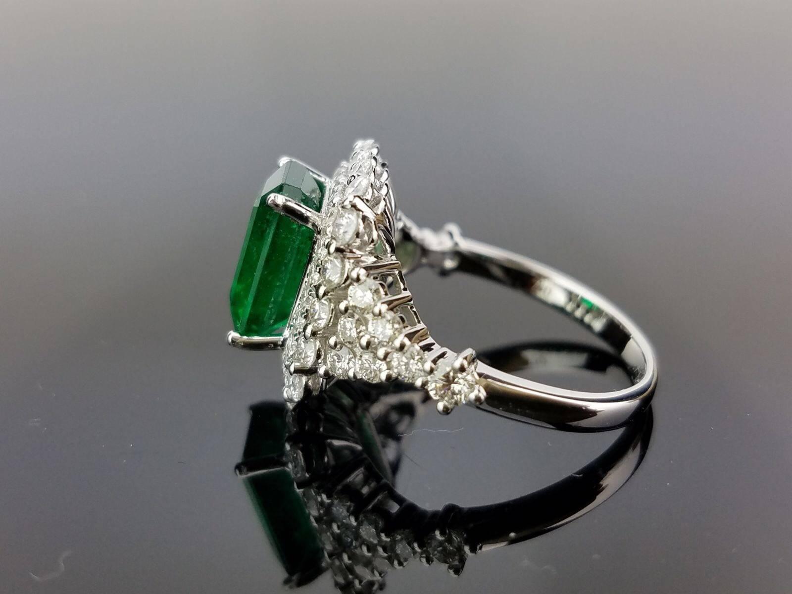 Emerald Cut 2.97 carat Emerald and Diamond Cocktail Ring For Sale