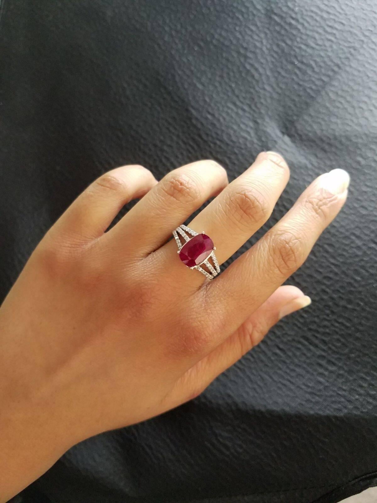 Oval Cut 5.59 Carat Oval Ruby and Diamond Cocktail Ring