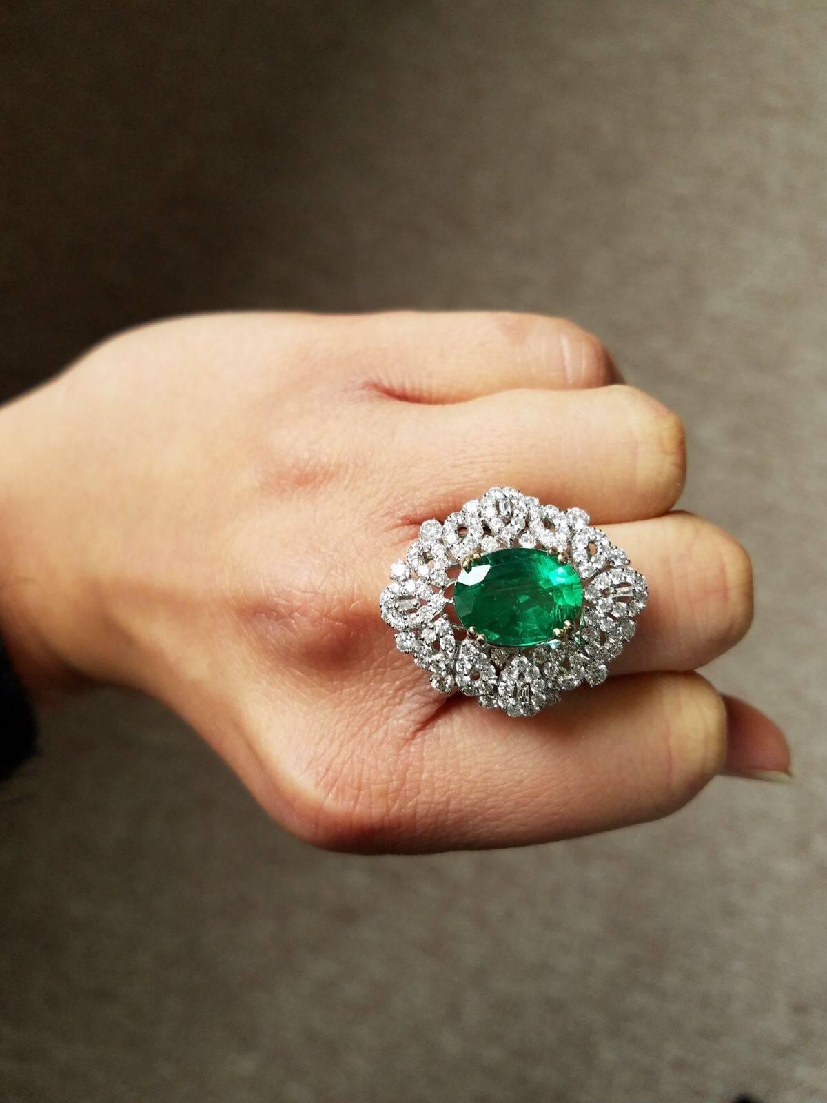 Modern Certified Insignificant Oil 4.95 Carat Oval Emerald and Diamond Cocktail Ring