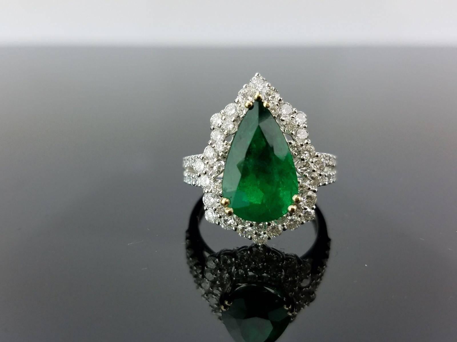 An elegant cocktail ring using high-quality Zambian Emerald of beautiful colour and White Diamond, all set in 18K white gold. 

Stone Details: 
Stone: Zambian Emerald
Carat Weight: 3.36 Carat

Diamond Details: 
Total Carat Weight: 1.63
