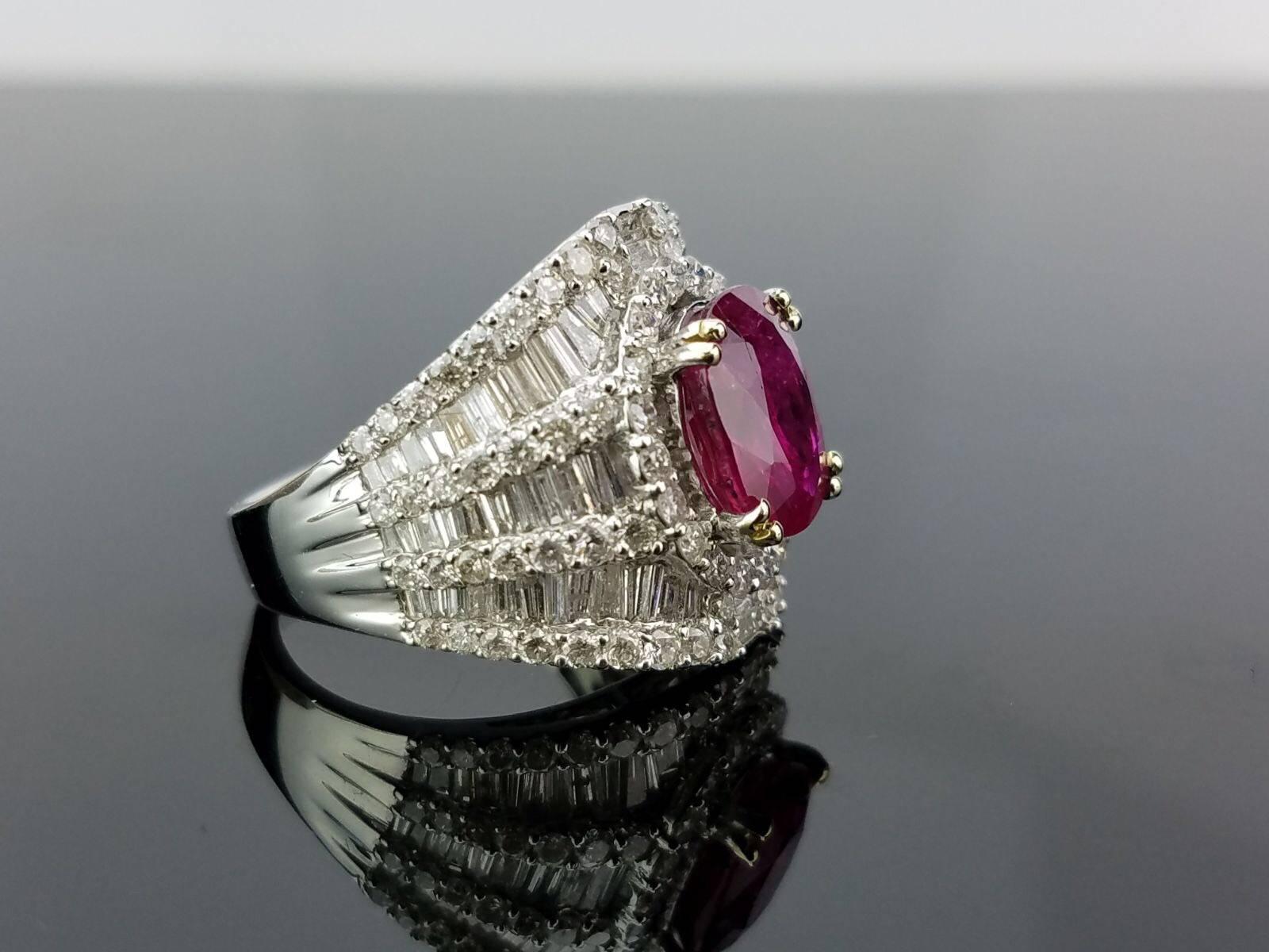 A beautiful, lustrous Ruby cocktail ring surrounded by baguettes and brilliant cut white diamonds, all set in 18K white gold.

Stone Details: 
Stone: Ruby
Carat Weight: 3.58 Carat

Diamond Details: 
Total Carat Weight: 2.91 carat
Quality: VS/SI ,