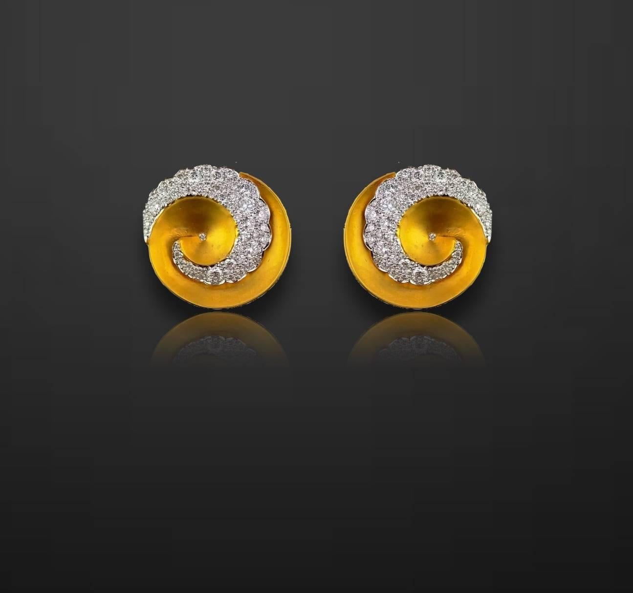A pair of beautiful, contemporary 18K yellow gold stud earrings, with white diamonds.

Diamond Details: 
Total Carat Weight: 2.49 carat 
Quality: VS/SI , H/I

18K Gold: 4.60 grams  