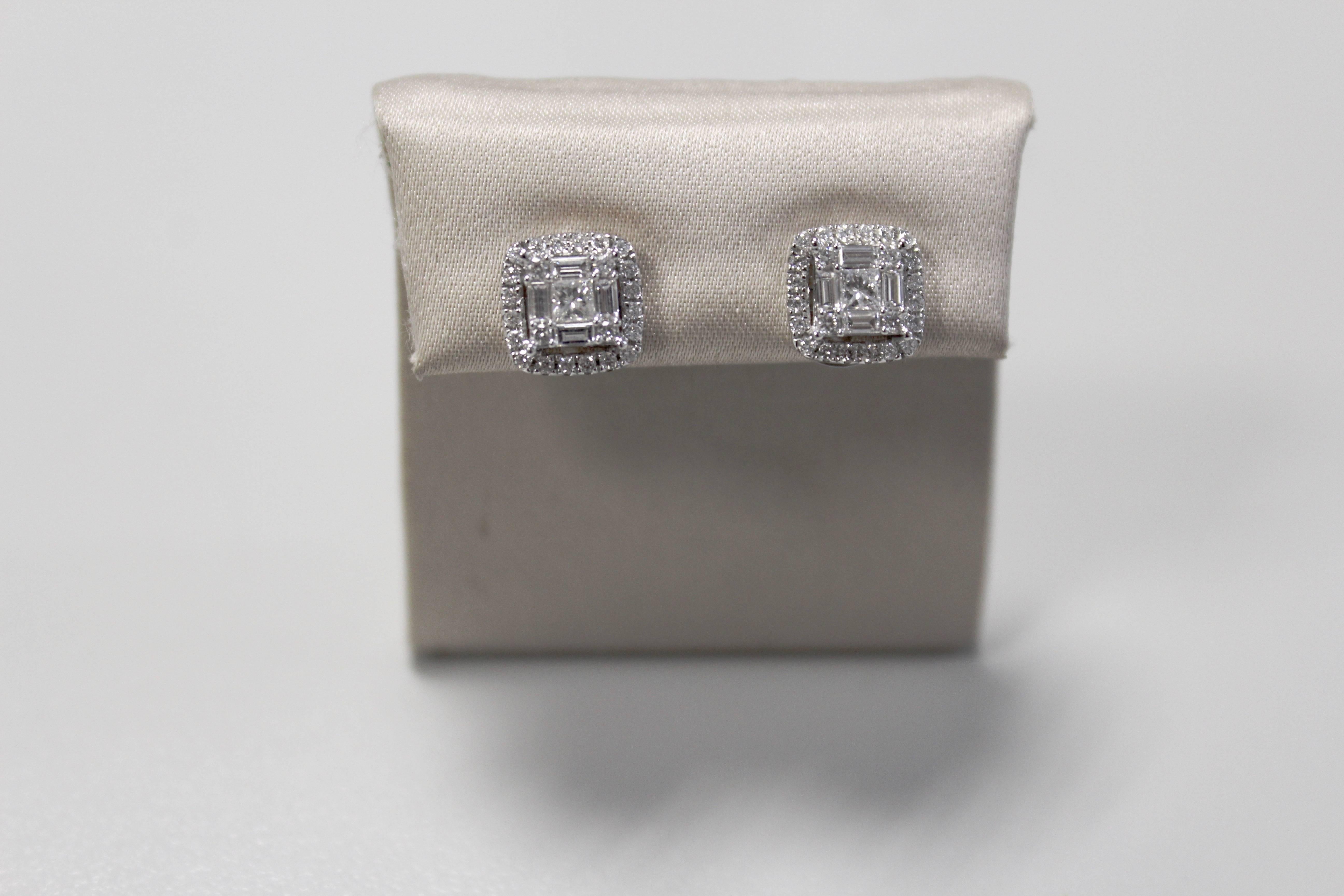 A pair of 18 carat white gold earrings set with a central motif of 4 baguette diamonds and brilliant cut diamonds for a total of 0,82 carats . These earrings are for pierced ears

Revinving the purest tradition of antique jewellery  ,Our jewels are
