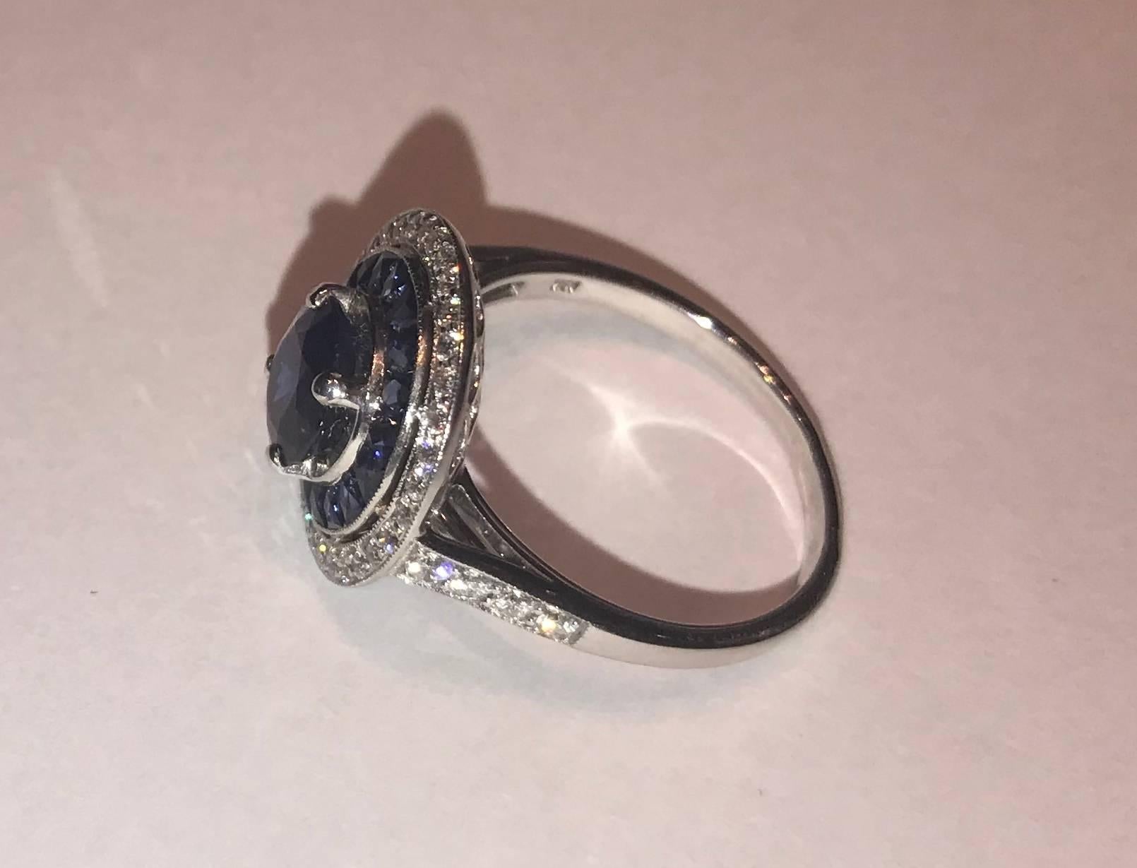 The Victorine ring is in 18 carat white gold set with a round sapphire weighing 2,80 carats surrounded by caliber cut sapphire and 0,60 carats of brillant- cut diamonds.

As a familly tradition, Valerie Danenberg is a jewelry designer and a