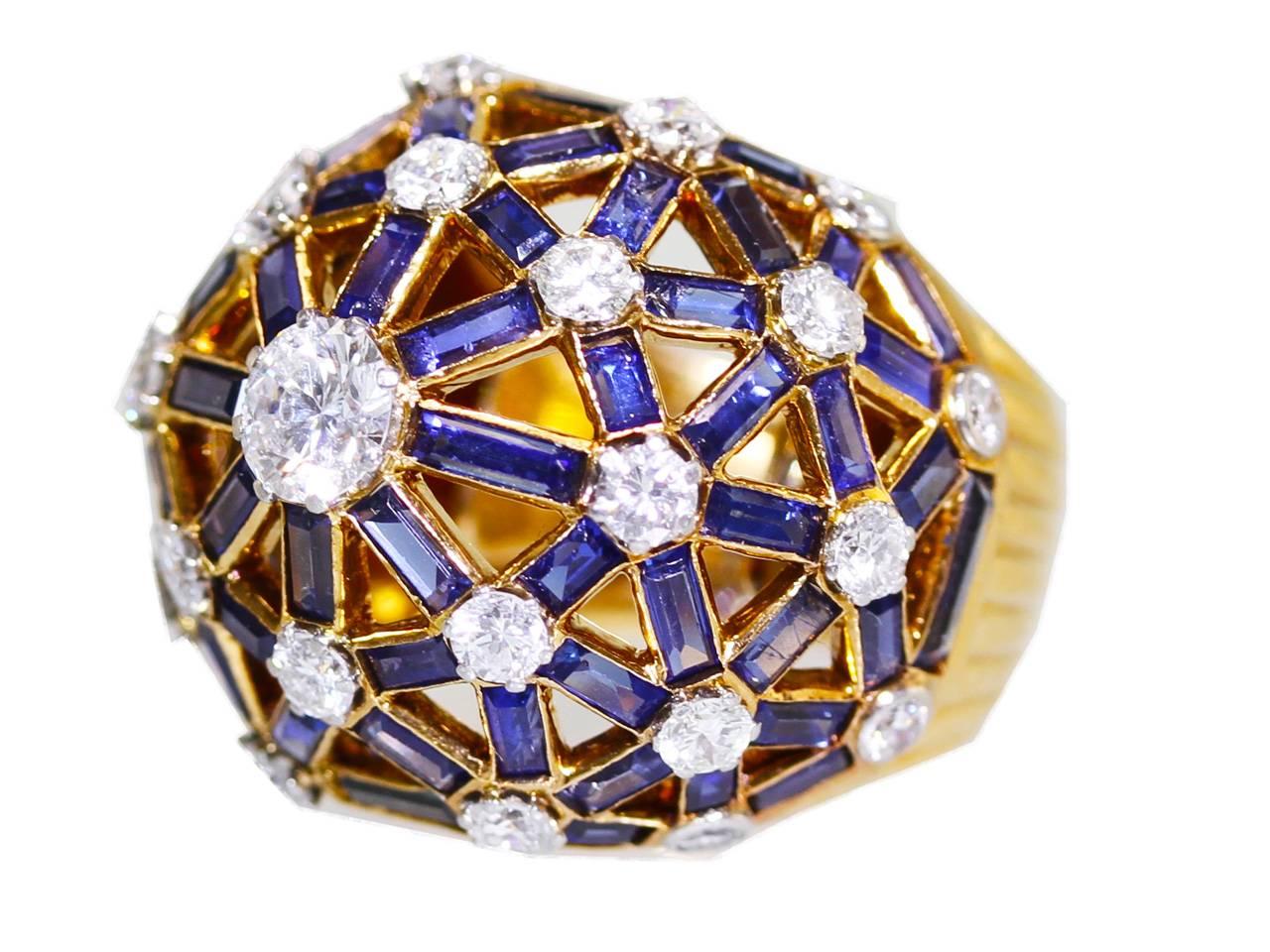 18 it. Gold, sapphire, and diamond ring by Mellerio, Paris, circa 1960. Diamond weigh approximately 2.25 carats, and sapphire weight approximately 5.00 carats. Signed Mellerio, Paris and numbered 390.11, with French assay marks.