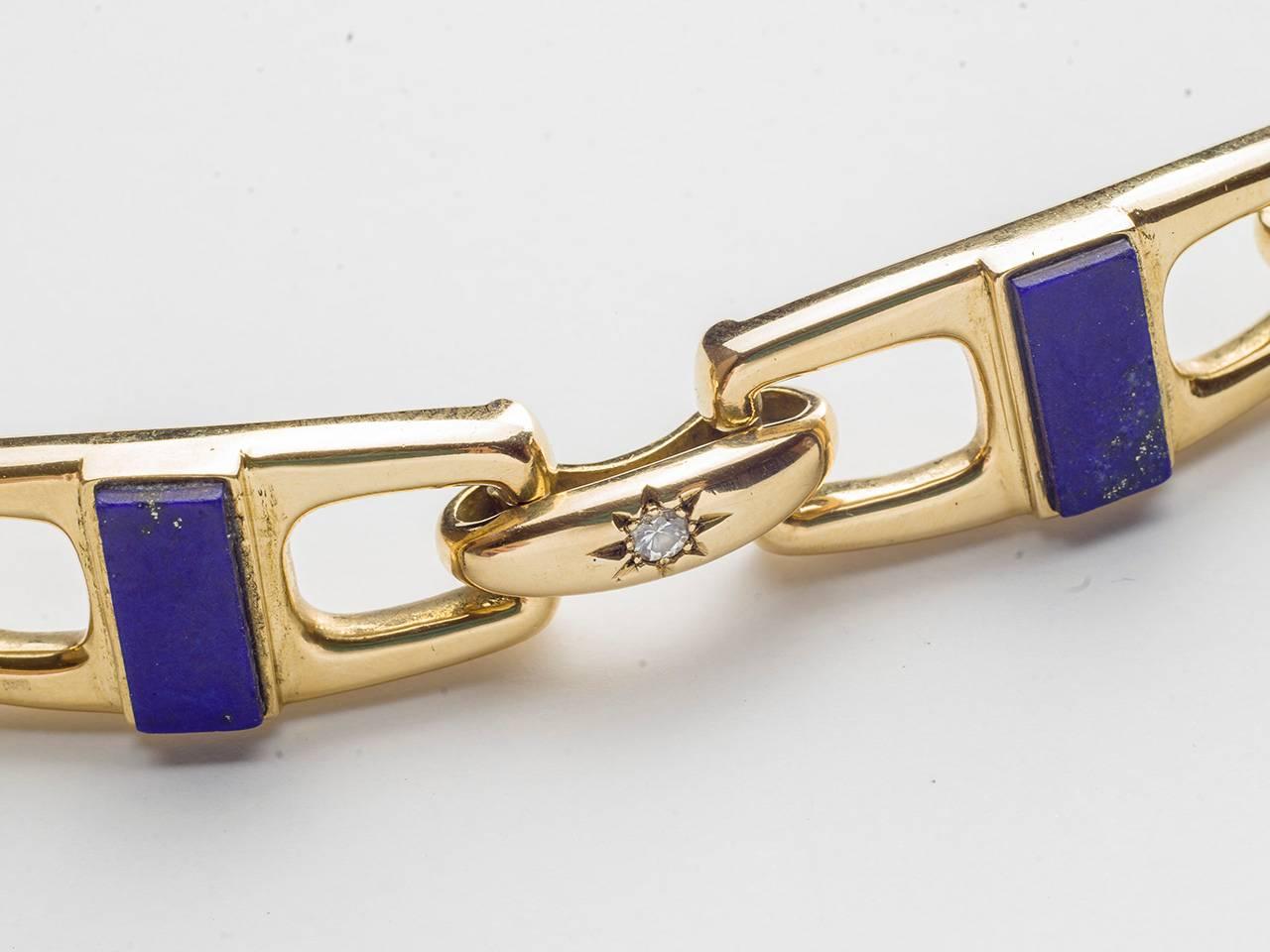 18kt. Gold link bracelet , inset with lapis and diamonds. Signed VCA 2V972