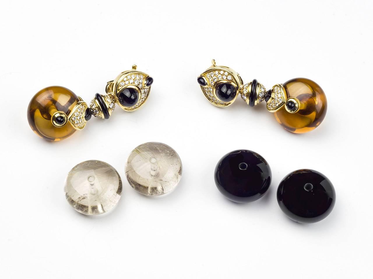 18k gold and Russian quartz Pneus earpendants by Marina B 1978. Comes with 2 additional interchangeable beads - onyx and ritualted quartz and screwdriver. Signed MARINA B, 750, and numbered.