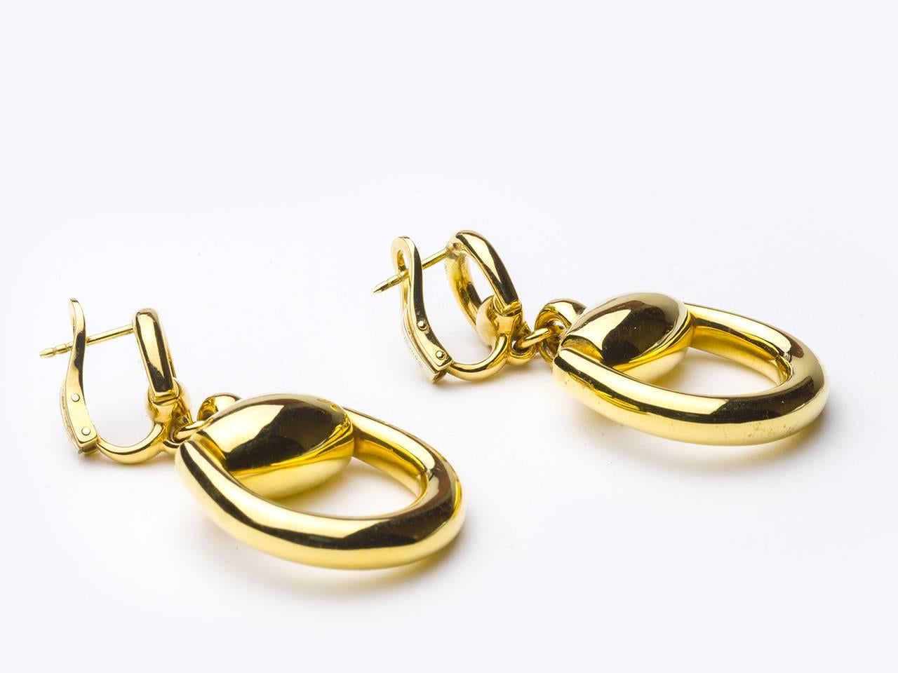 18k gold earpendants, signed GUCCI, AU750