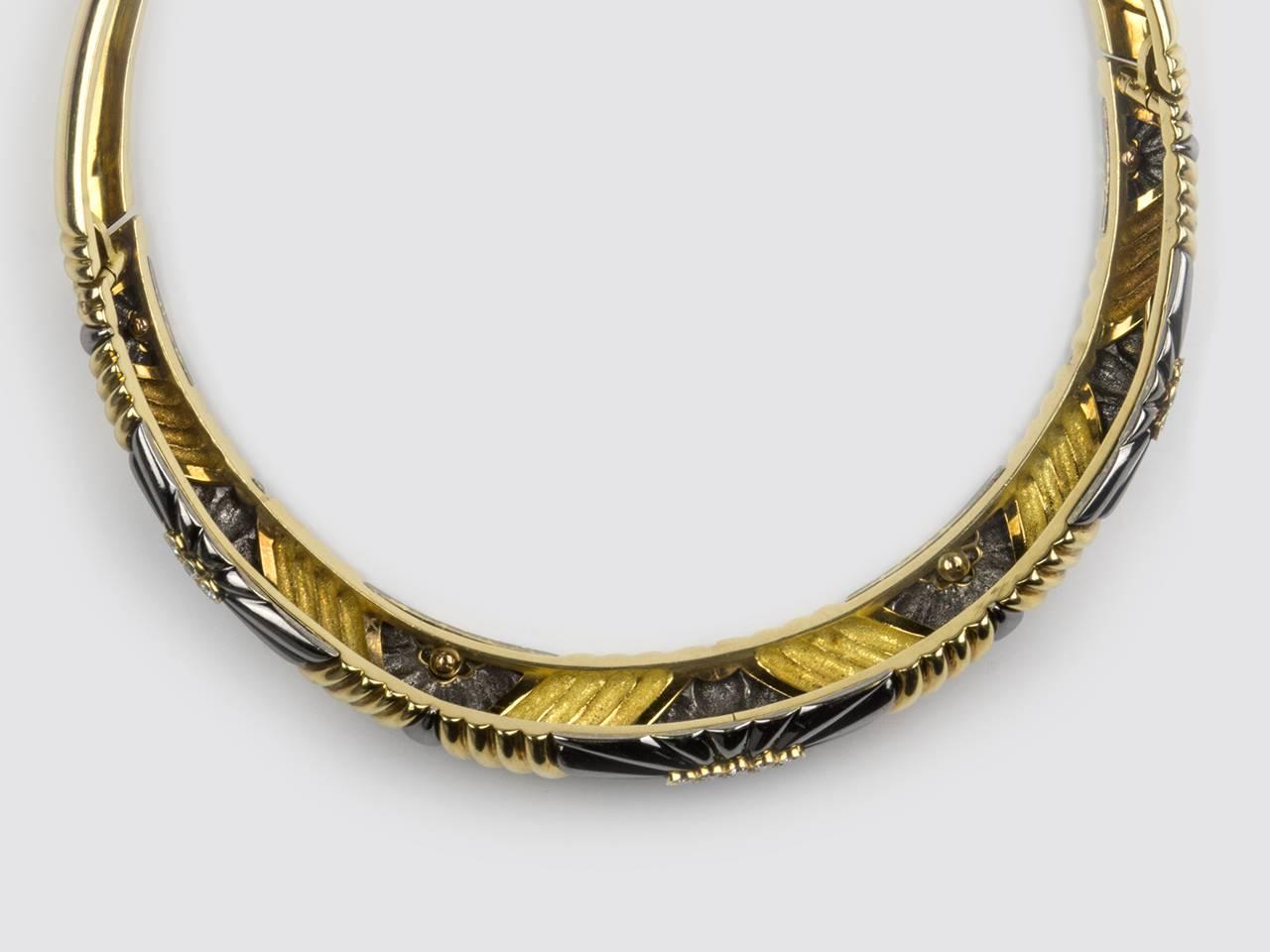 18k fluted gold collar in a chevron designe, set with diamonds. Signed CHAUMET.
