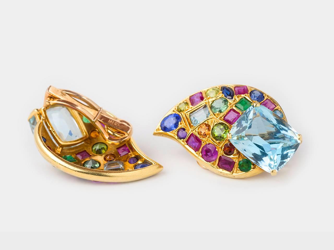 18k gold Earclips in paisley shape, set with multiple precious and semi-precious gemstones.