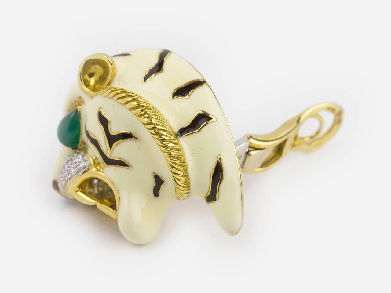 18k gold enamel “tiger” Earclips set with emerald eyes. Markers mark. Italian marks.