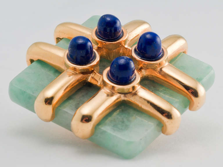 18 kt. gold earclips,consisting of a jade plaque topped with a gold grid with lapis ball accents. Signed CARTIER, A. CIPULLO 1974