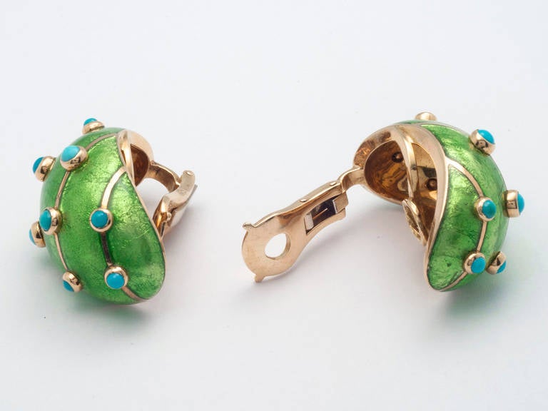 18kt. Enameled gold Earclips set with cabochon turquoise. Signed SCHLUMBERGER.