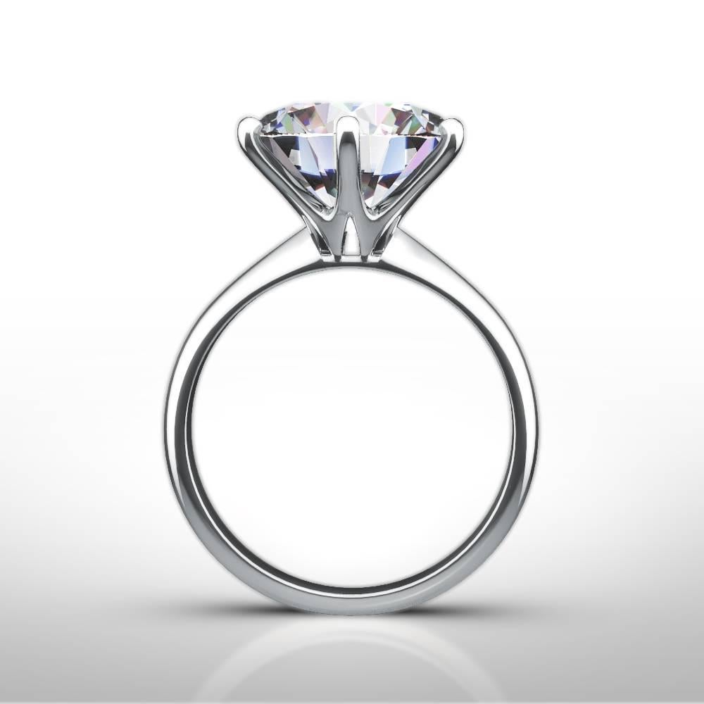 Stunning 5.03ct F-VS2 brilliant cut round natural diamond engagement ring crafted in lustrous platinum in the classic 6 claw Tiffany style setting. All ring sizes available as made to order and hand finished to perfection by our skilled craftsmen in