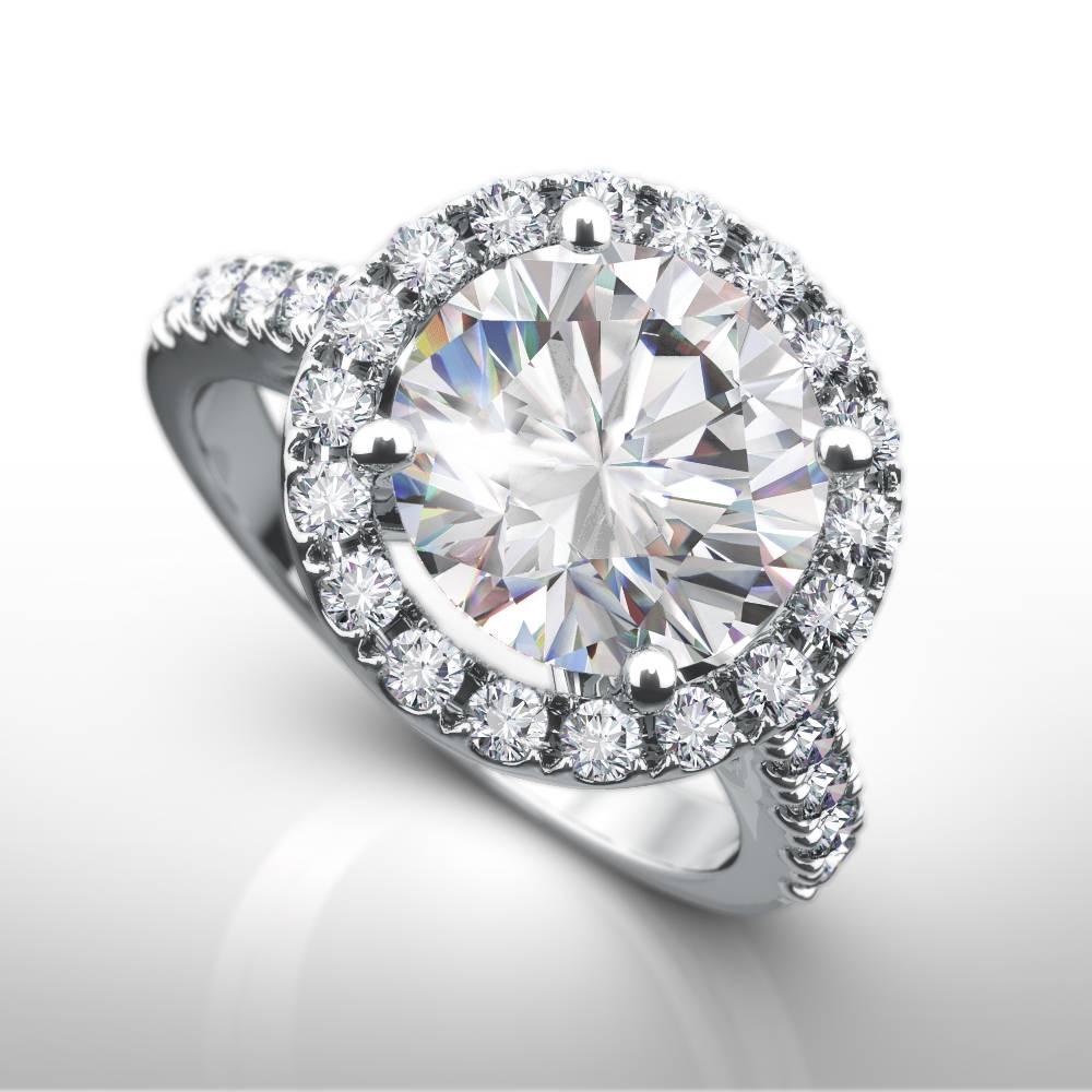 Beautiful rare white brilliant cut natural diamond engagement ring crafted in a lustrous platinum halo diamond ring with diamond set shoulders. The centre stone is 1.73ct F-VS1 measuring 7.71mm diameter and the overal halo is approx 10mm. All ring