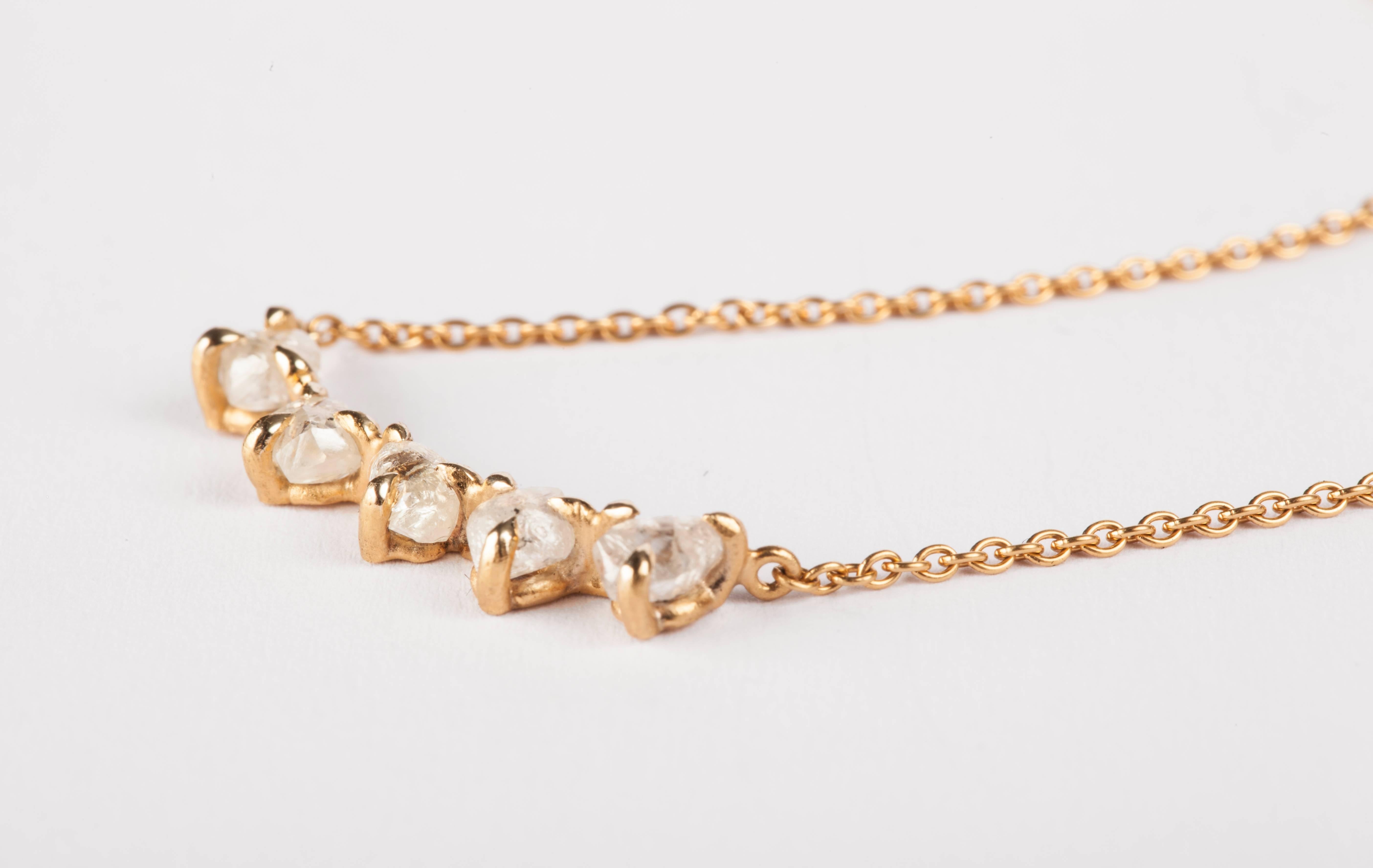 1.17 ct. Natural Whitish Rough diamonds in 18K handcrafted gold necklace.
Origin of diamonds: Russia.

Every rough diamond from Roughdiamonds dk has been personally handpicked by Maya Bjørnsten. The diamonds we reject are sent back to be cut into