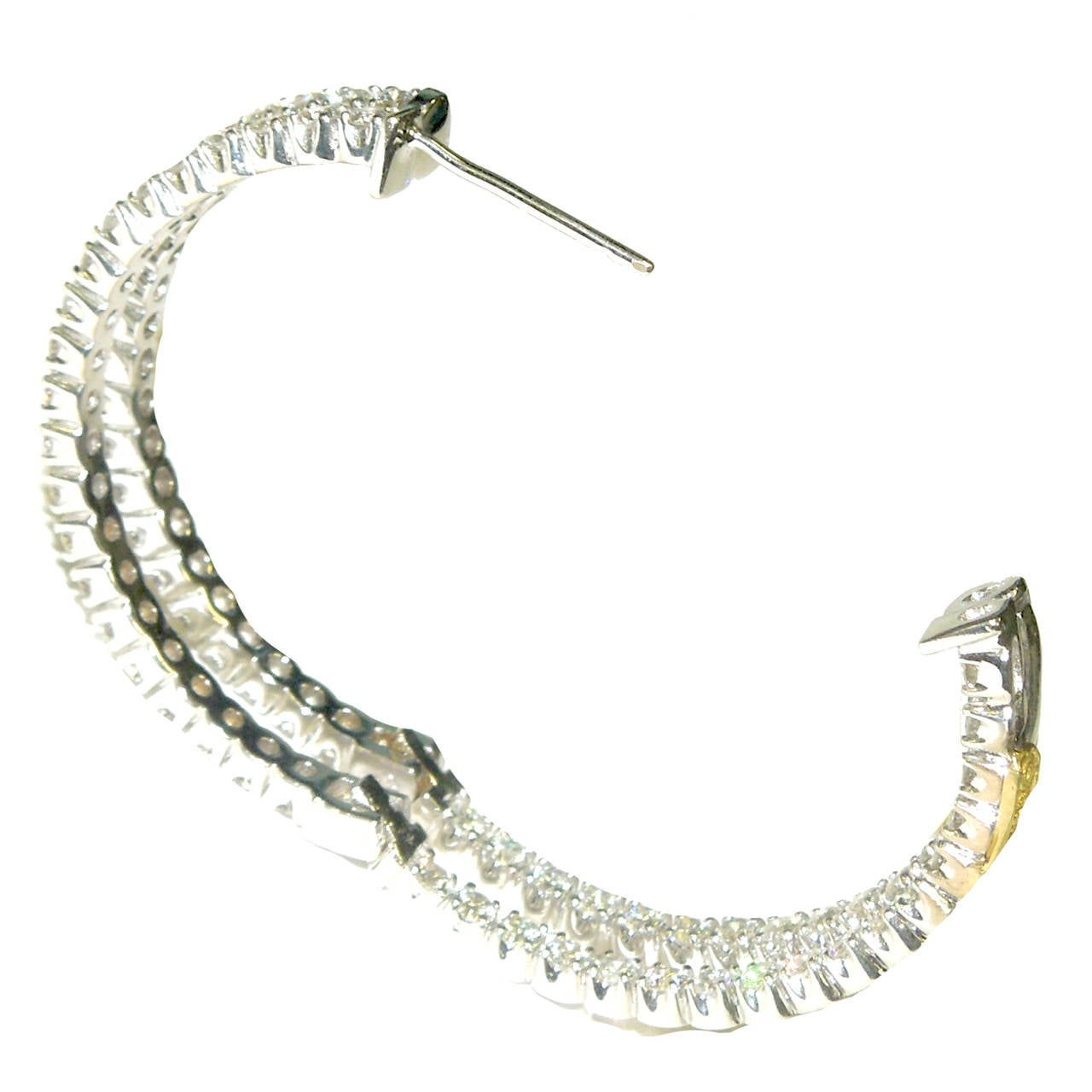 18K White Gold Double Hoops with inside-out white diamonds

6.12 ct.'s of G Color, VS Quality Diamonds

Diamonds are inside out as seen in the photos

Back of the earrings are signed STAMBOLIAN with our Trademark 