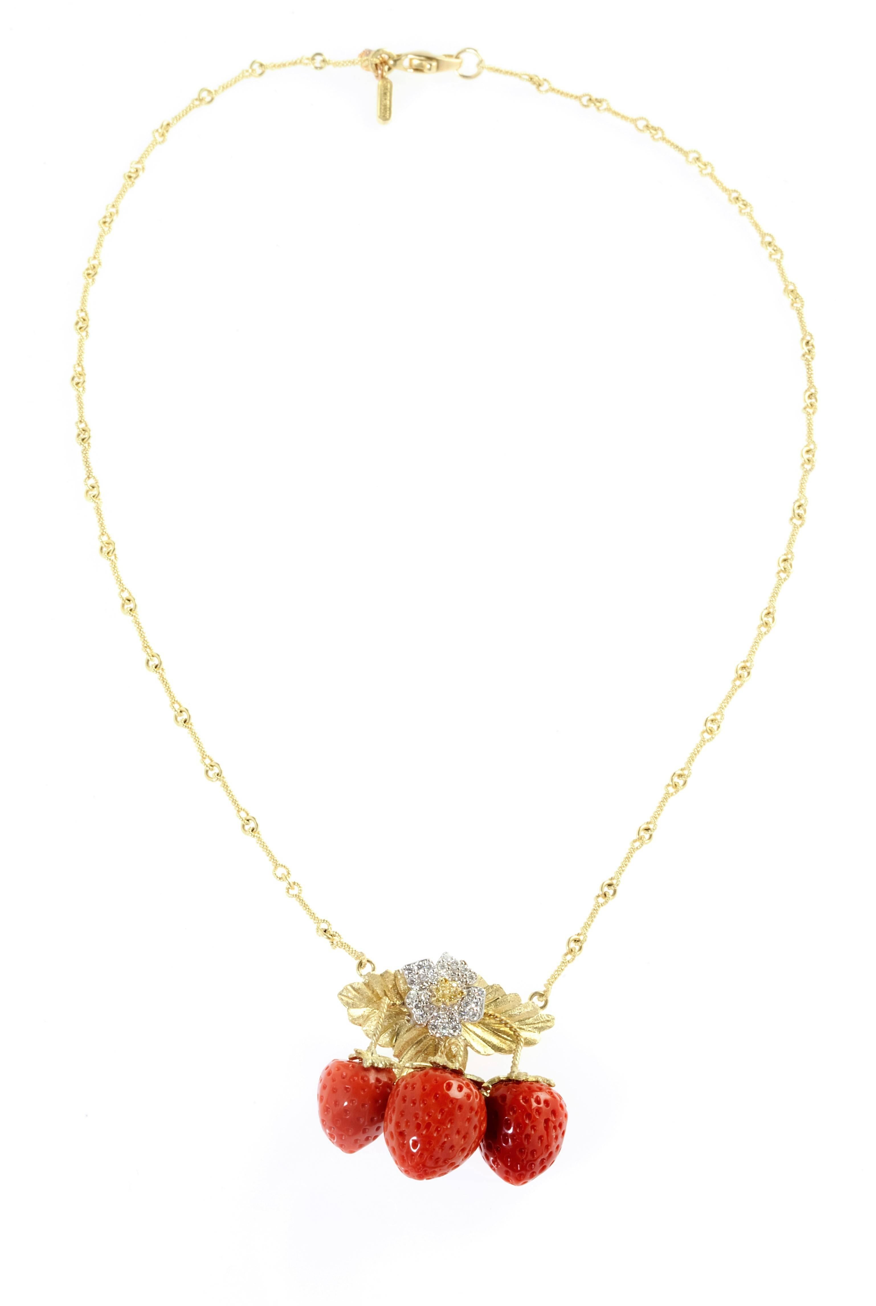 ONE OF A KIND Estate Strawberry Coral 18K Gold and Diamond Pendant necklace by Stambolian

Corals are special-cut strawberries, done by hand. They look extremely real.

Above the corals are our floral design-works, done with yellow and white