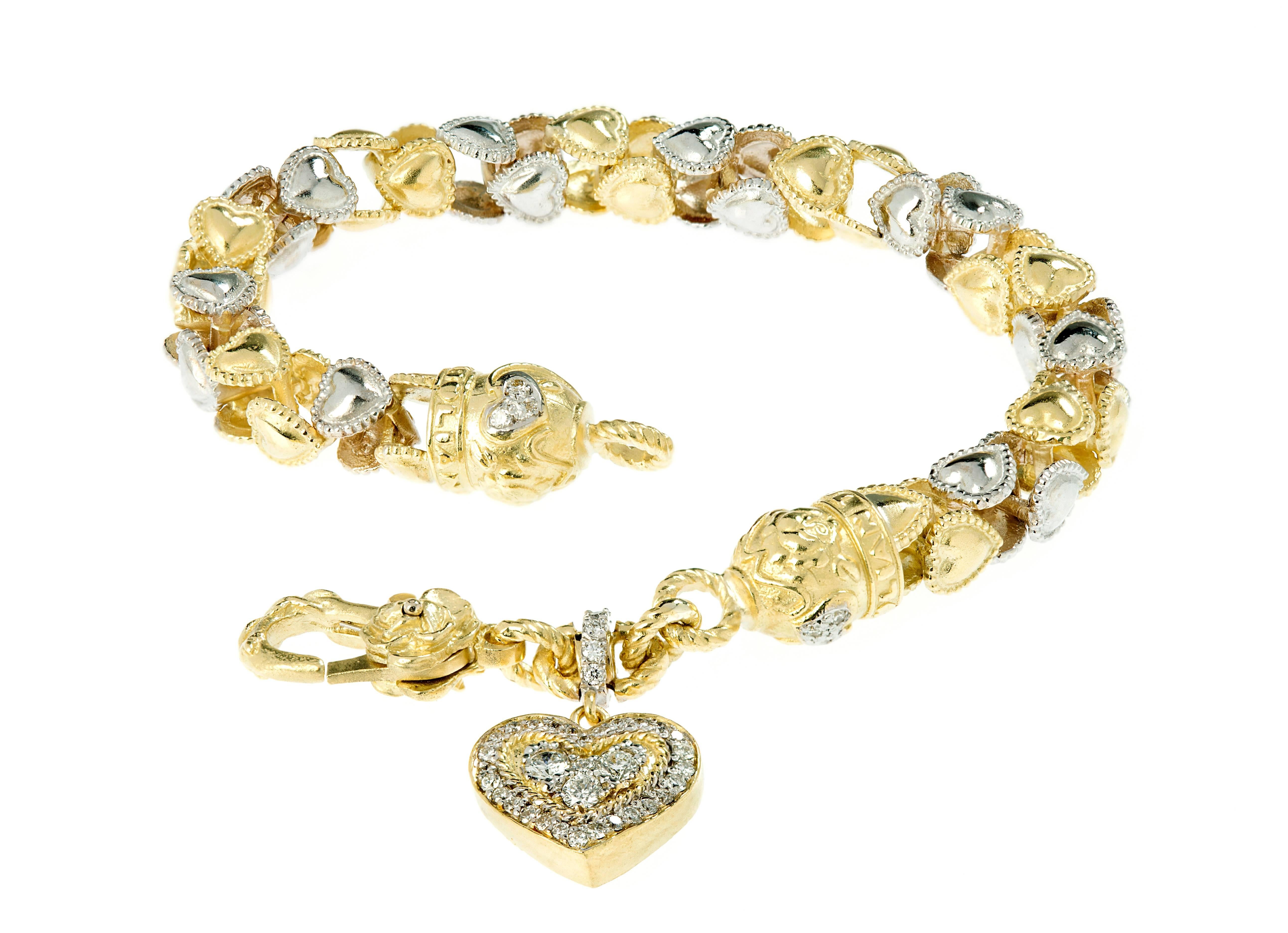 Stambolian Two-Tone Gold Heart Link Bracelet with Dangling Diamond Heart

This is the 