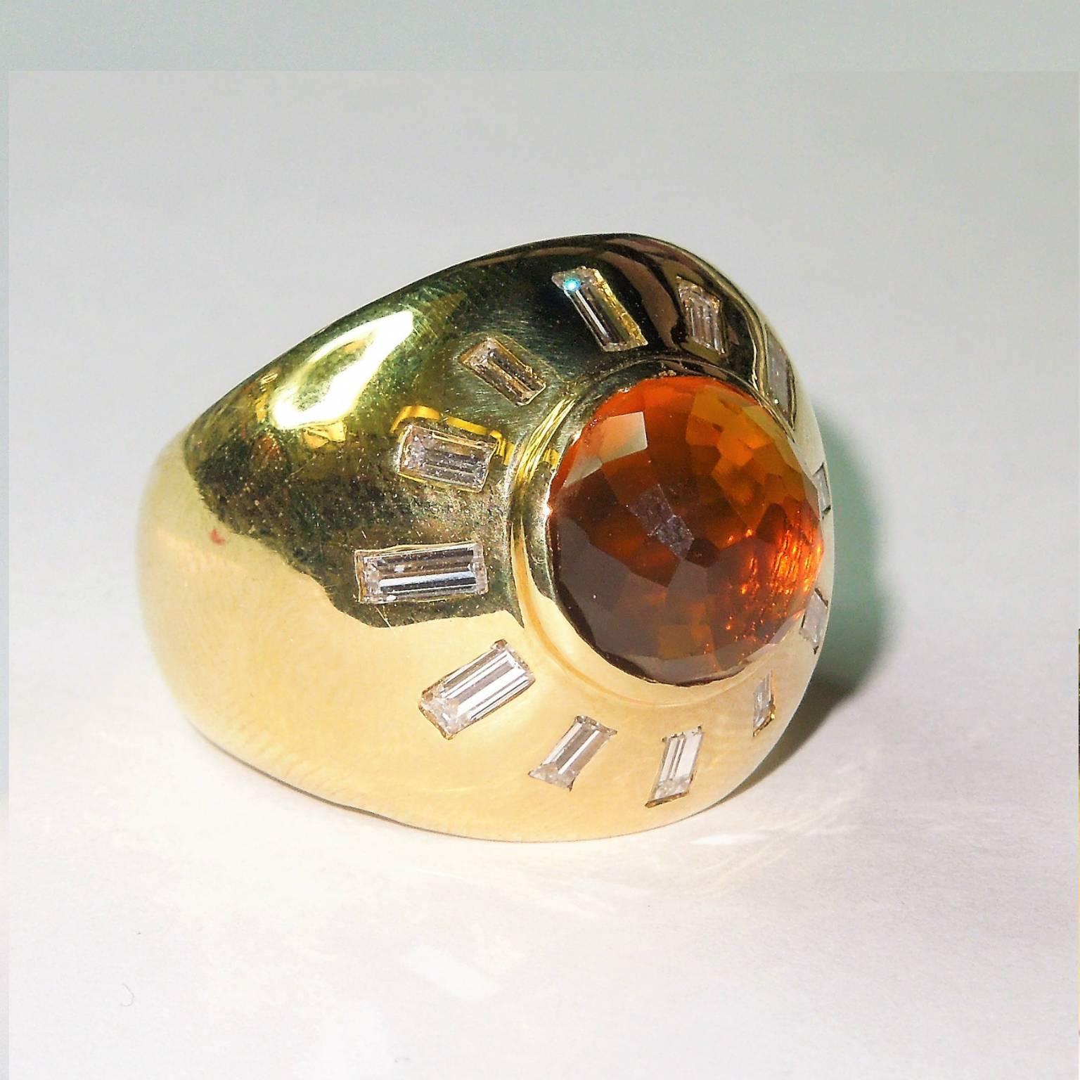 18K Gold Ring with Checker-board cut Orange Quartz Center and Emerald Cut Diamonds

Orange Quartz Center 6.00ct apprx.

12- Emerald Cut Diamonds. Apprx. 1.20ct 

Ring face width: 0.8 inch

Currently size 6 but sizable.

Estate
