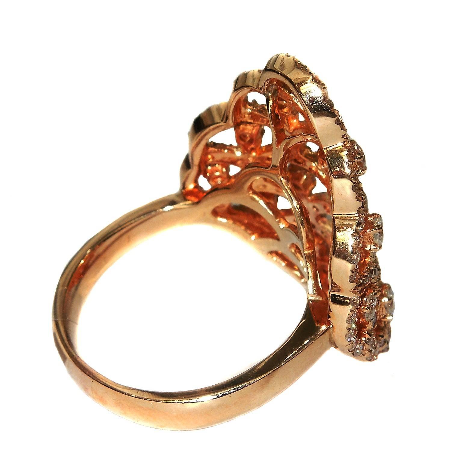 18K Pink Gold Ring with Diamonds

1.83ct. G Color, VS Clarity Diamonds

10.18 grams 18K Gold

Made in Turkey. 

Currently size 8 but can be sized up or down.

Estate