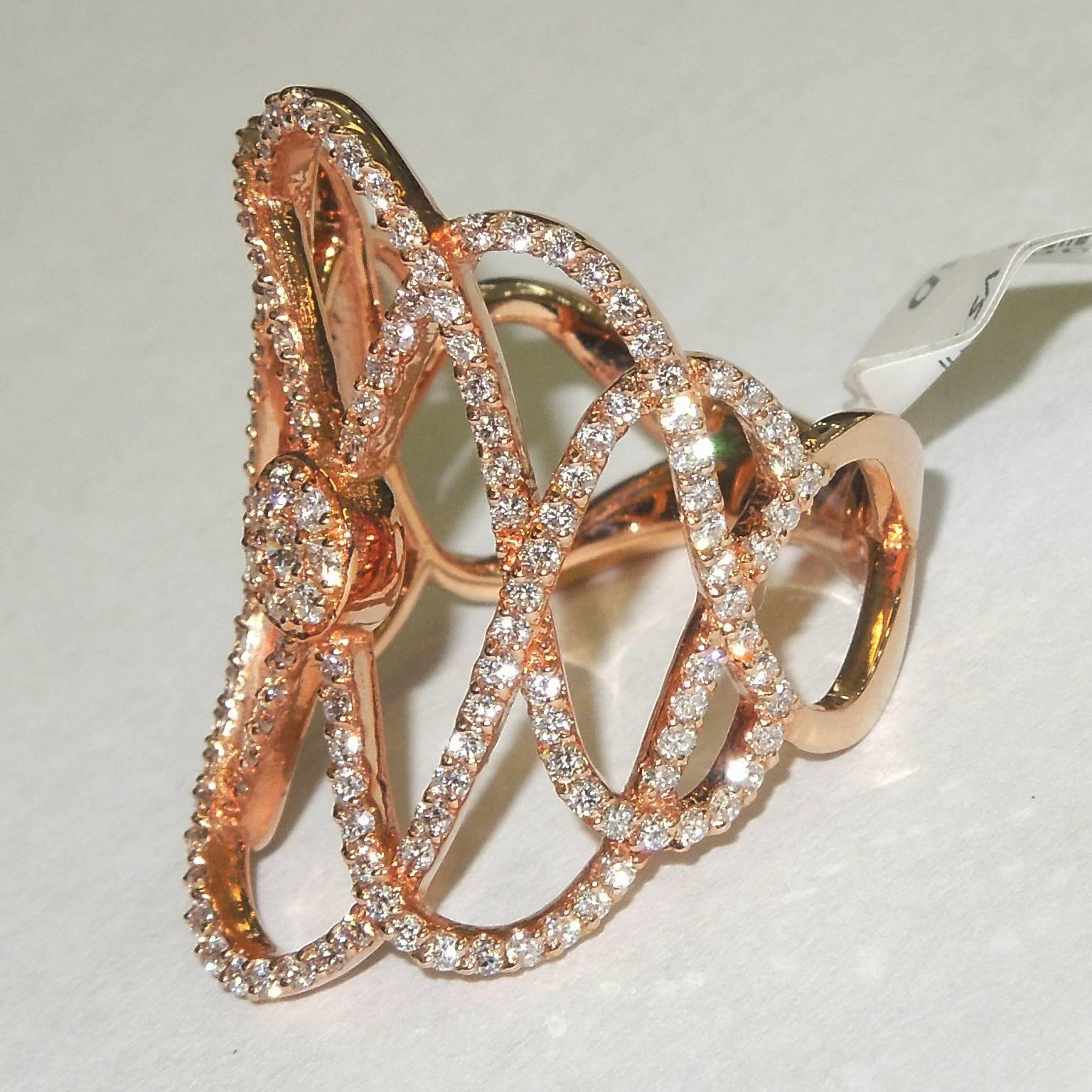 18K Rose Gold Ring with Diamonds

1.29ct. apprx. G Color, VS Clarity Diamonds

8.59grams 18K Gold

Width of face: 1.1 inch
Band width: 0.4 inch

Available in sizes 5-12.

