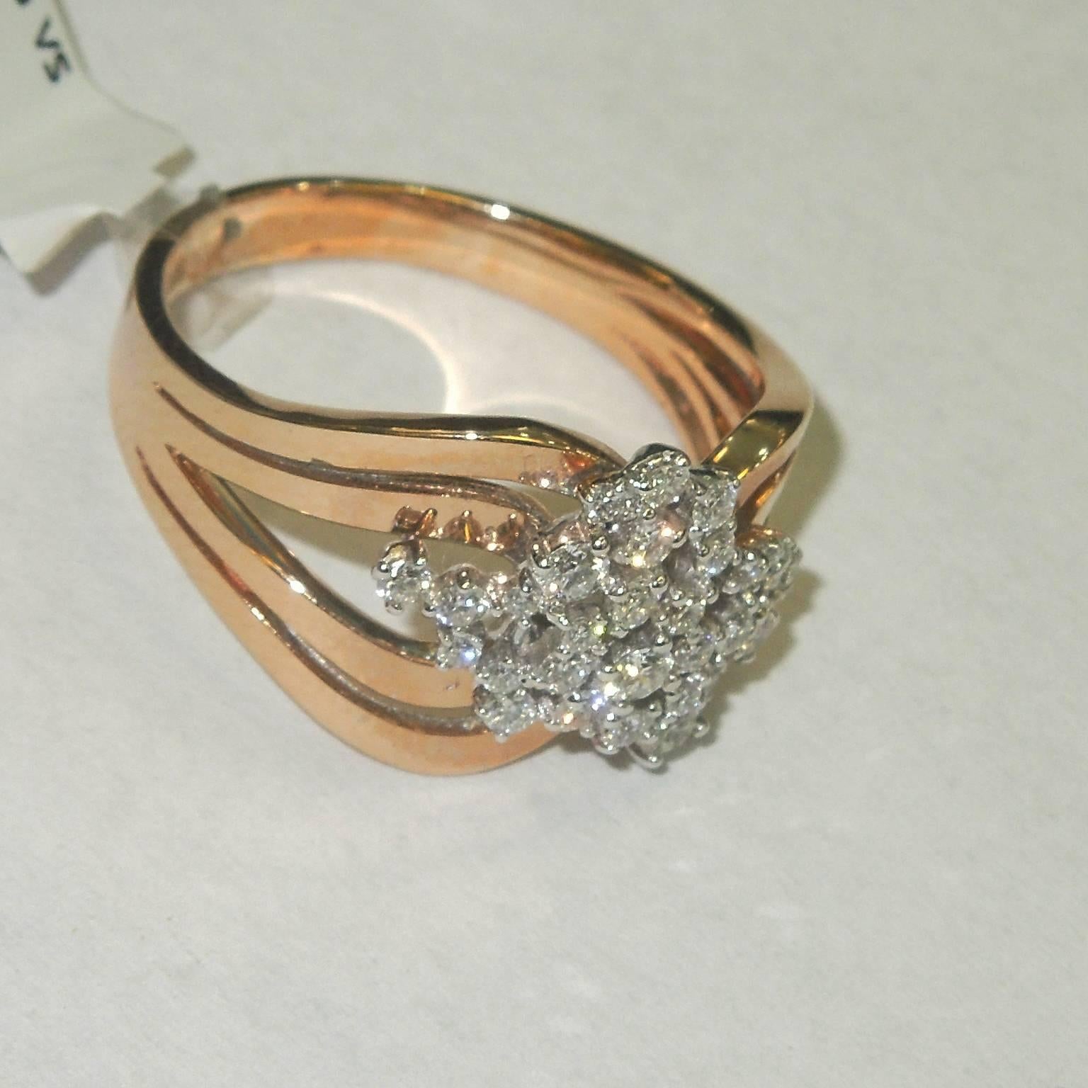 18K Rose Gold Ring with Diamonds

0.45ct. apprx. G Color, VS Clarity Diamonds

0.2 inch band width
0.4 inch face width

5.27 grams 

Available in sizes 5-12.