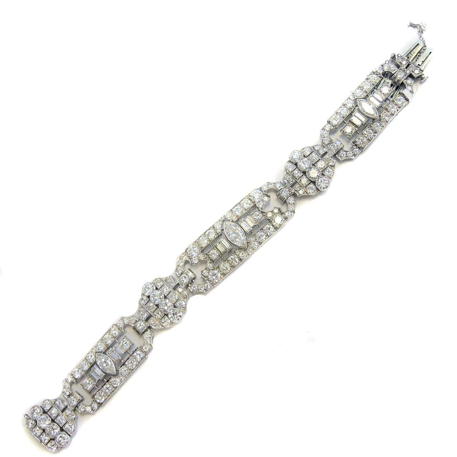 Platinum Bracelet with Marquis and Round cut diamonds

17.20ct. apprx. Total Weight Diamonds

Bracelet is done in Platinum

3 Marquis cut diamonds on bracelet.

6.5 inches length. 0.6 inch width

Safe clasp used