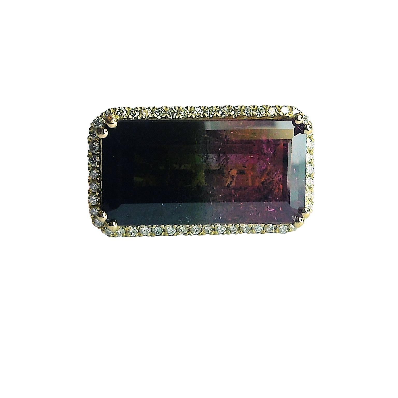 18K Gold and Diamond Ring with Watermelon Tourmaline Center

Beautiful Bi-Color Watermelon Tourmaline center, 20.54ct.

0.75ct. Diamonds total weight.

Hand made open work ring, face of the ring is 1 inch x 0.6 inch

Currently size 6.5. Can be sized