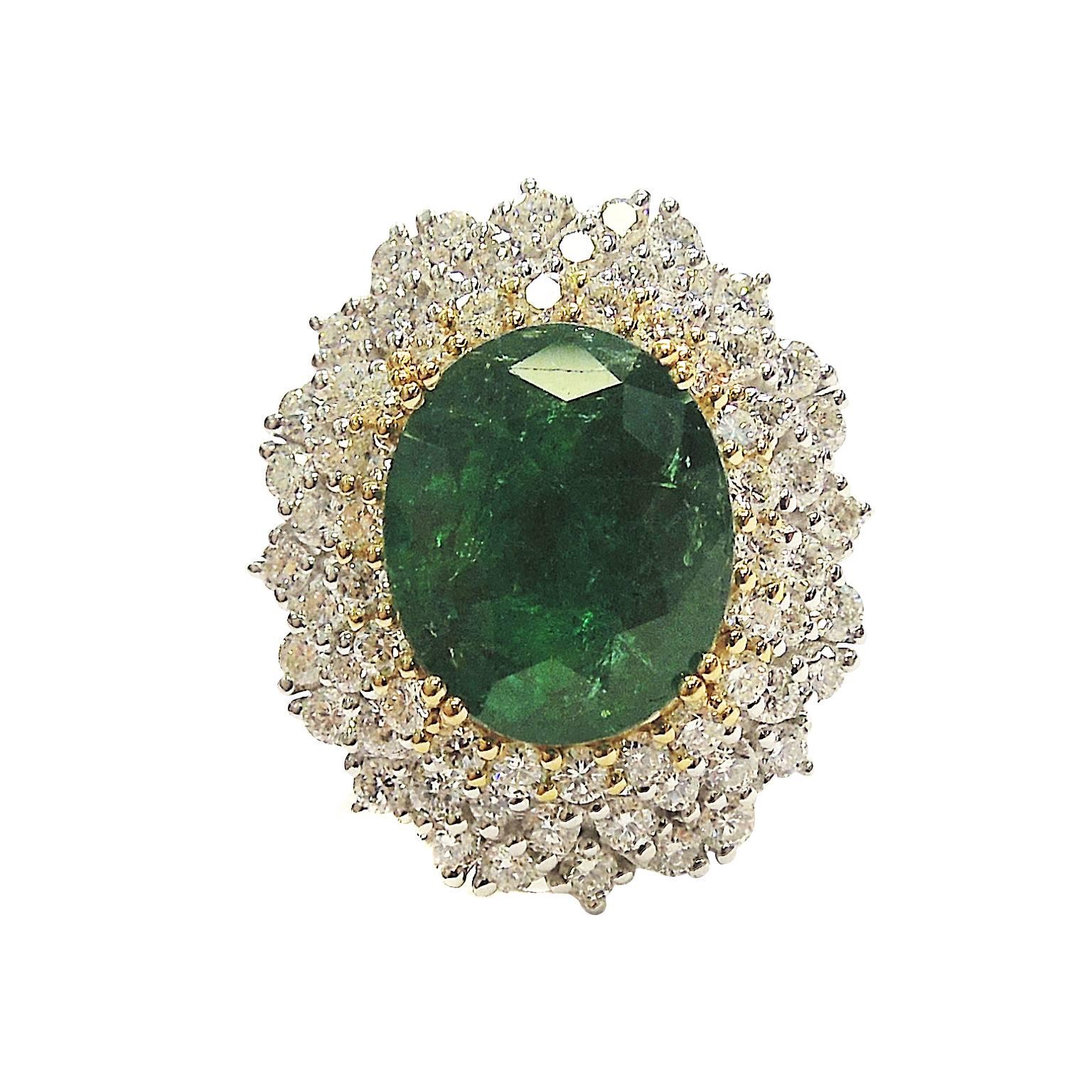 18K White Gold Ring with Oval Shape Emerald Center and Diamonds

Center Oval Shape Emerald, 5.03ct.

1.75ct. H Color Diamonds

Face of ring is 1 inch x 0.8 inch

Currently size 5. Can be sized.