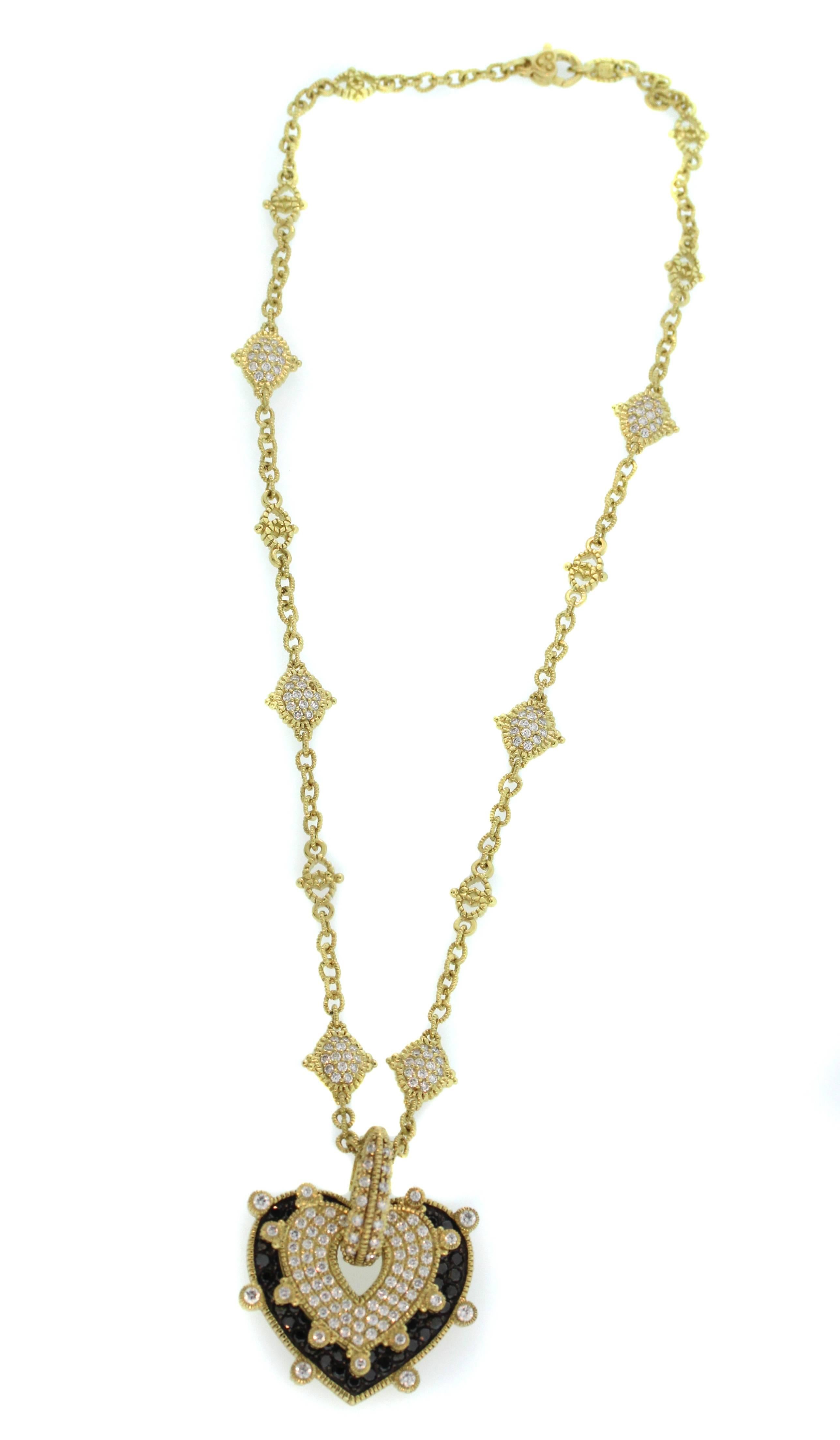 Judith Ripka

18K Gold Chain Necklace with Two-Piece, Black and White Diamond Pendant Enhancer. 

The Heart Pendant enhancer is two pieces. The black diamond layer is bottom portion, and the white diamond heart is a separate piece. Either can be