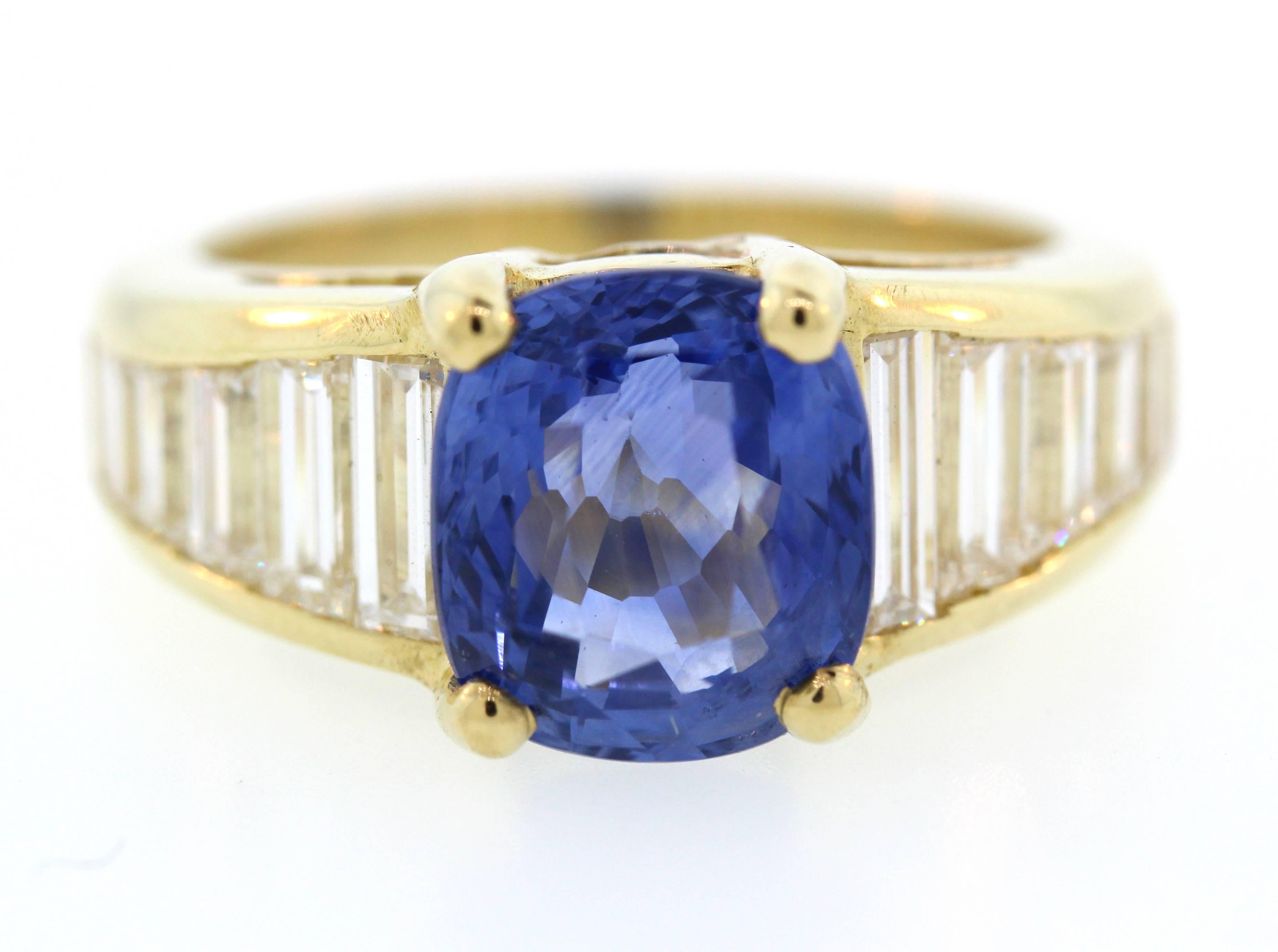 18K Gold Ring with 4.36 Carat AGL Certified Ceylon Blue Sapphire and Baguette Diamonds

Blue Sapphire is 4.36 carat. Cushion Cut. From Ceylon (Sri Lanka). Heat Treatment. 

Certification states: 
