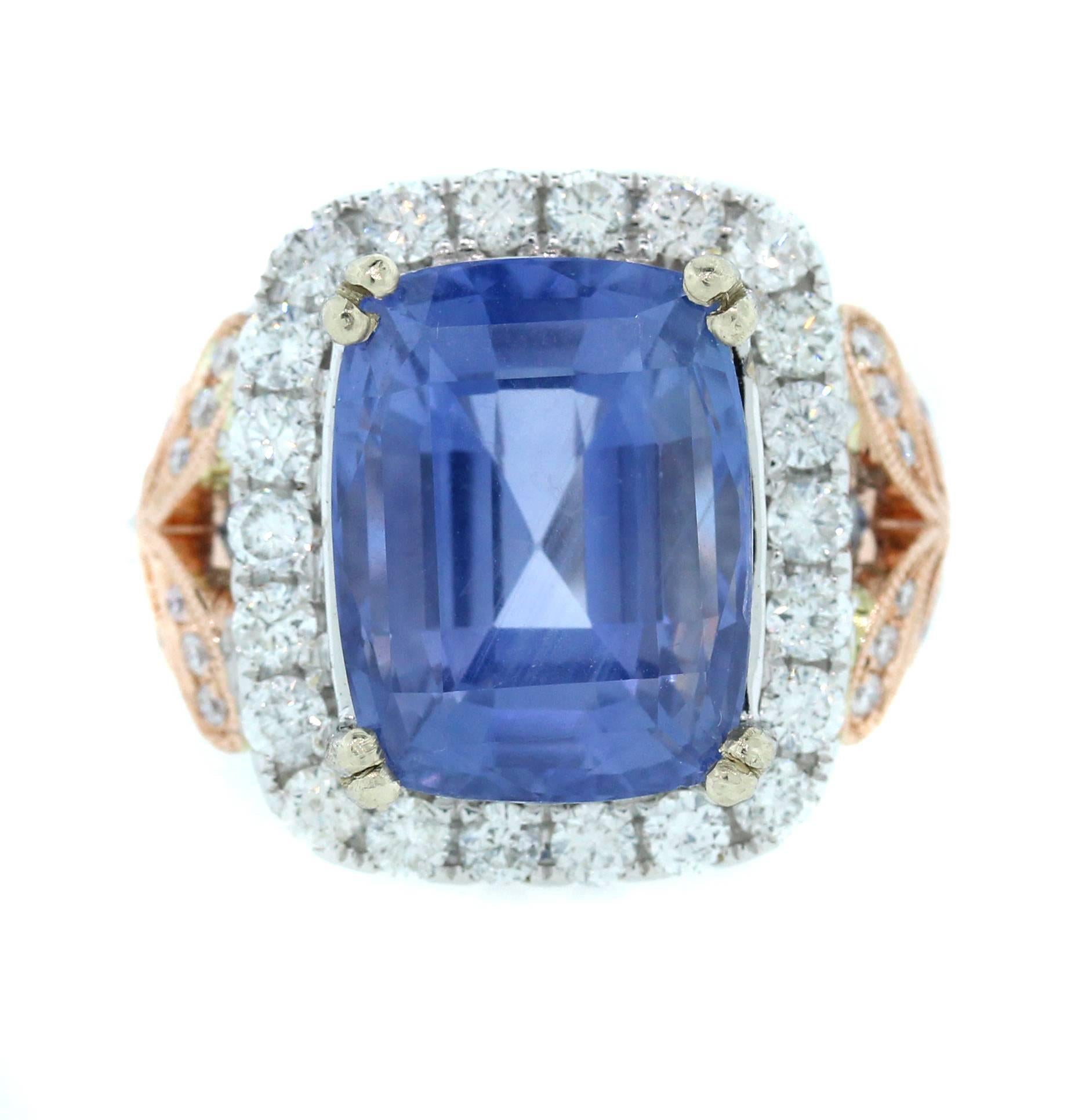 18K White and Pink Gold Ring with 10.67 Carat Ceylon Blue Sapphire Center and Diamonds

Blue Sapphire is 10.67 carat. Cushion Cut. From Ceylon (Sri Lanka). NO Heat Treatment. 

Certification states: 