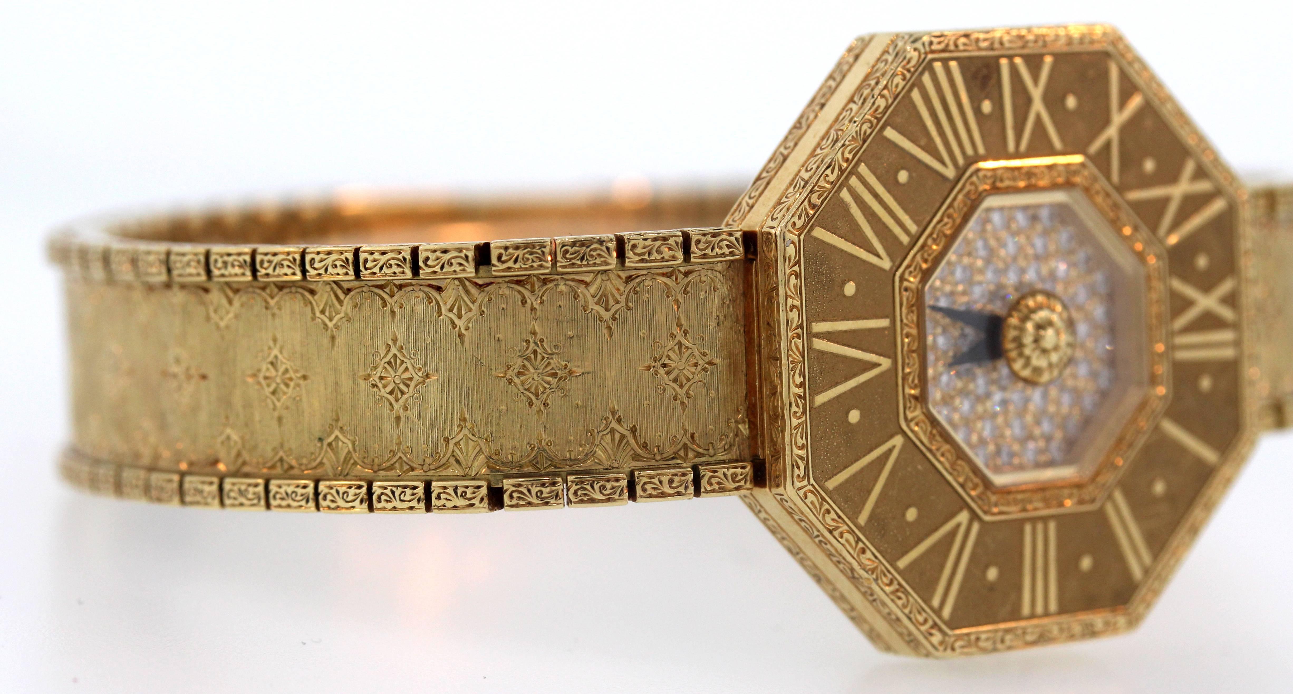 18K Gold Buccellati Oktachron Ladies Yellow Gold and Diamond Wristwatch

This watch from Buccellati is called the "Oktachron". Brushed yellow gold finish on watch band, hand engraved.

Watch face is apprx. 26mm with diamonds set, F-G