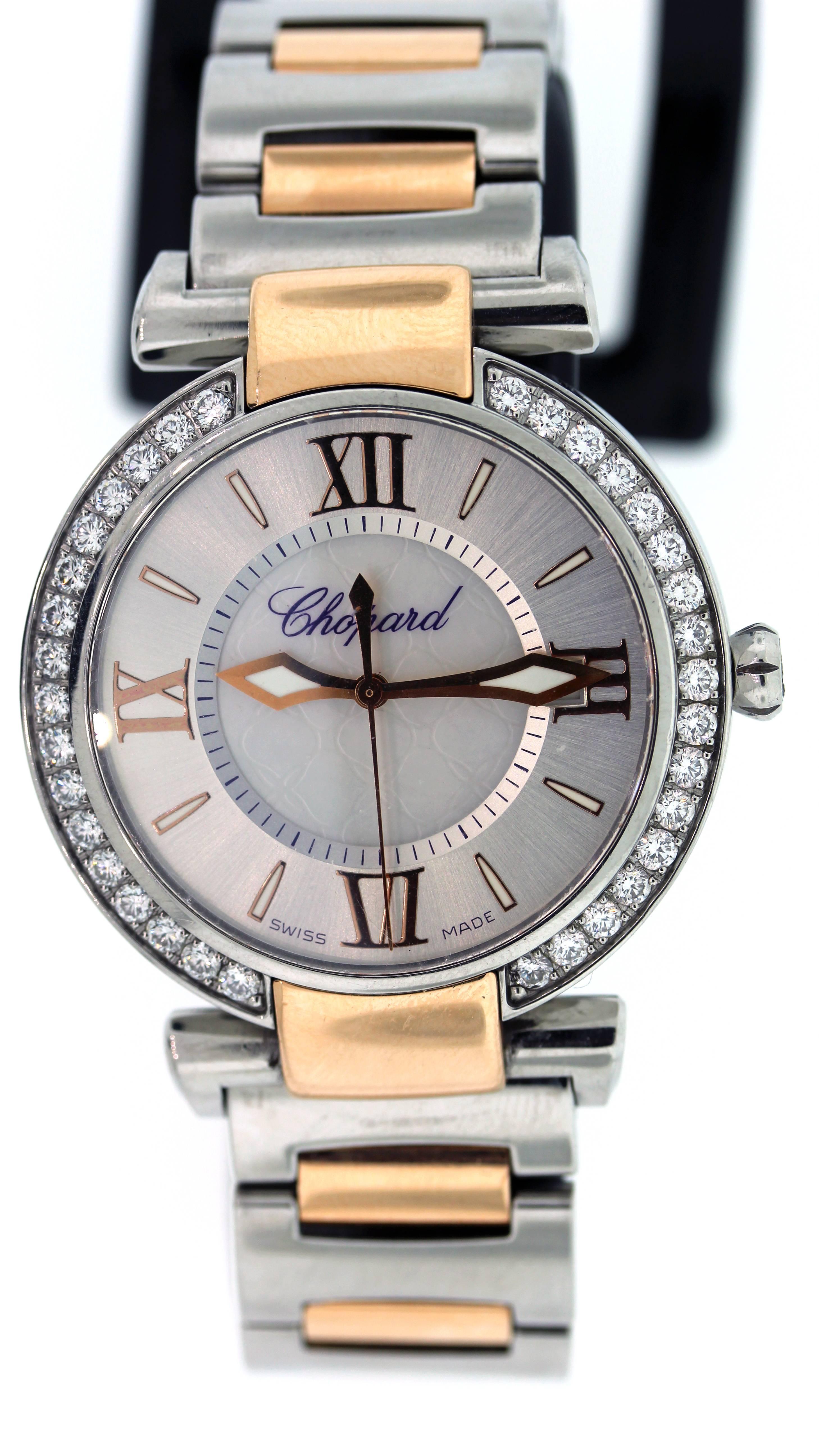Chopard Imperial Ladies Watch with Diamonds, Rose Gold and Stainless Steel

Ref: 388532-6004. 
Serial Number: 1757072

36mm Stainless Steel and Rose Gold case with one amethyst set in the crown. 

1.17ct. Diamond bezel, mother of pearl dial

Quartz