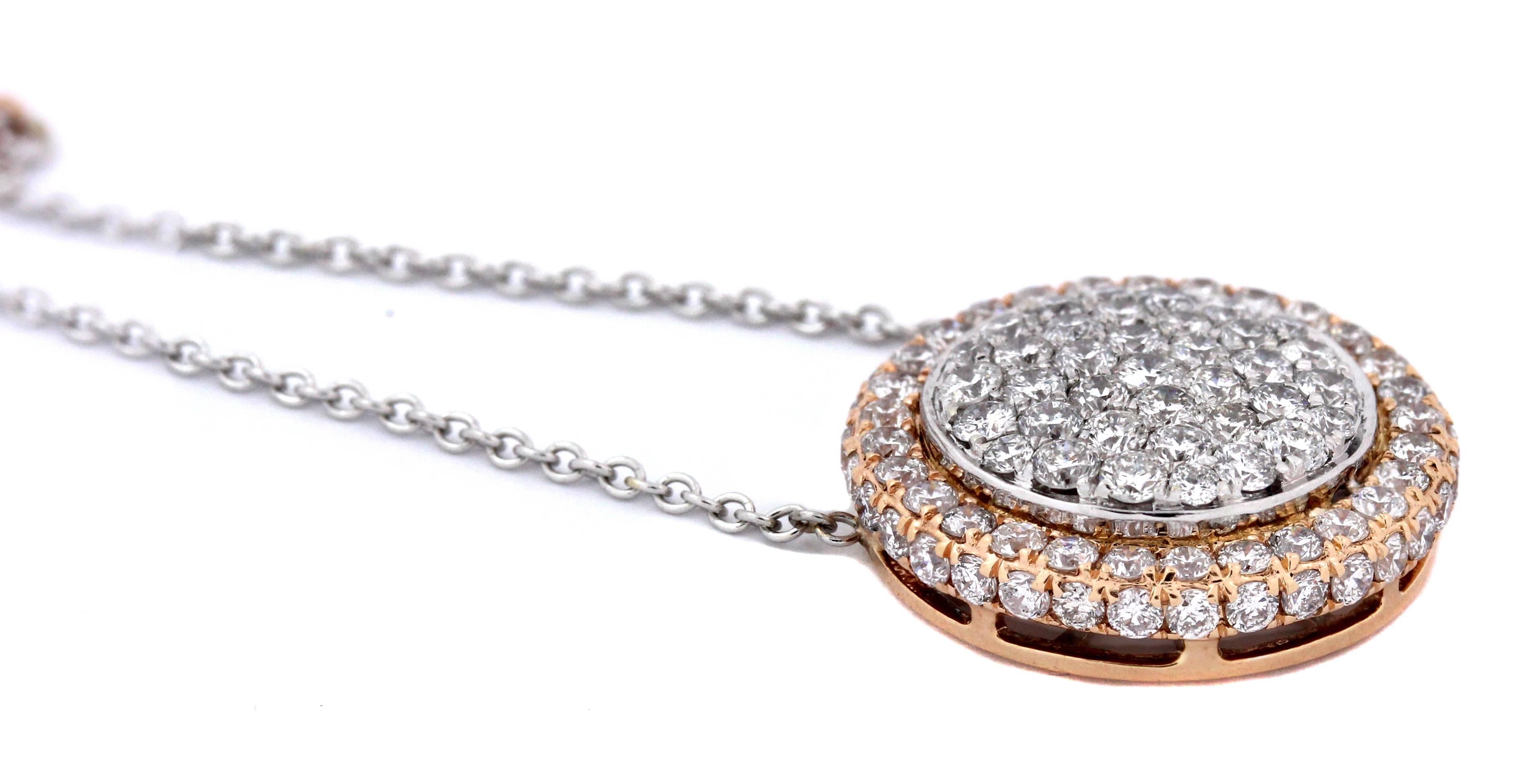 18K Rose and White Gold Diamond Pendant Necklace

Center is diamond pendant that is attached to chain. Diamonds cover the pendant entirely with white gold center surrounded by rose gold.

Center pendant has 1.50ct. in H Color SI Clarity Diamonds.