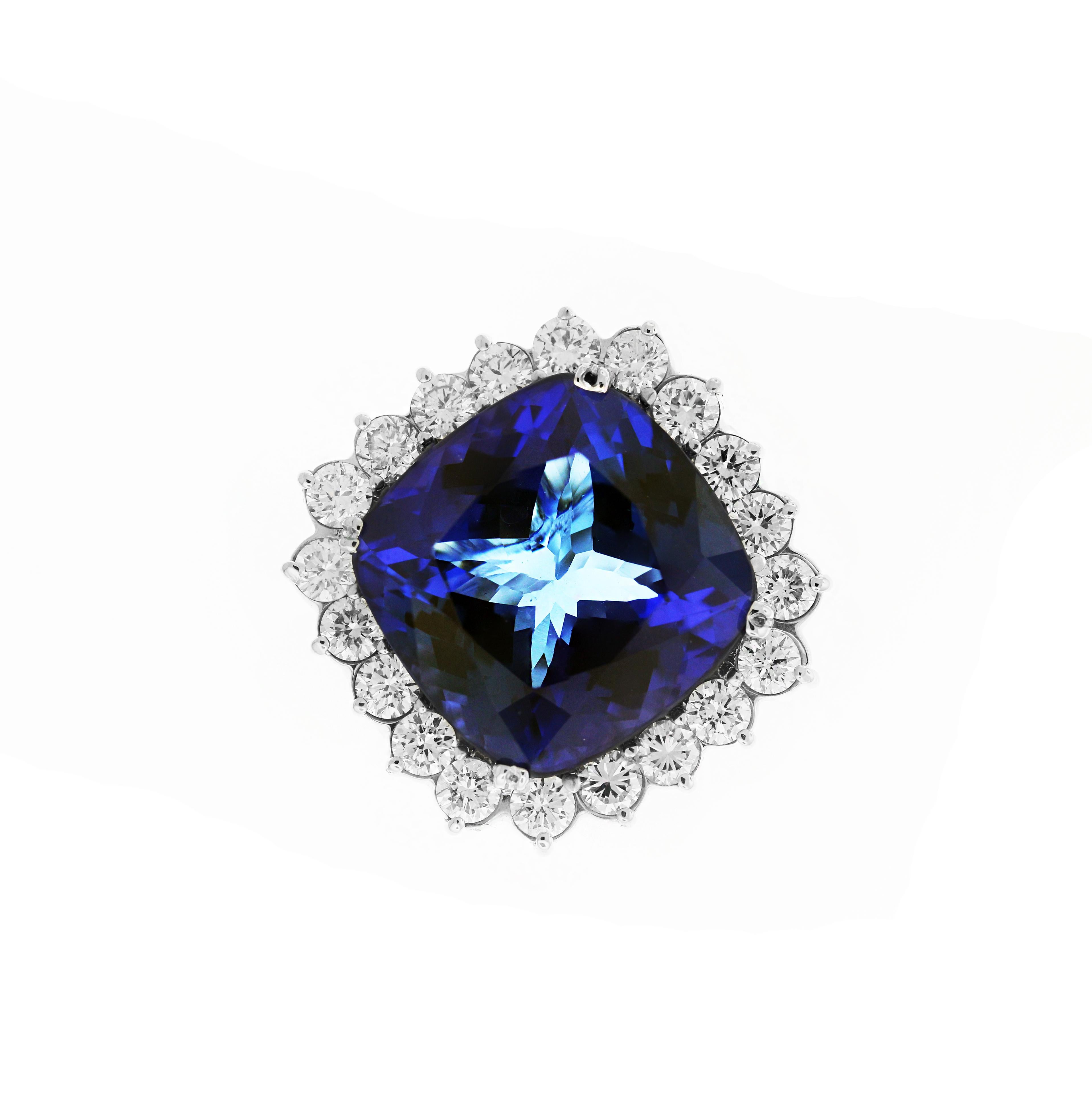 Platinum and Diamond Ring with 26.55 carat Tanzanite Center

Center Tanzanite is truly incredible. 26.55 carat and has unbelievable color. The tanzanite has royal blue and slight purple shade dependent on the light.

3.25 carat G color, VS clarity