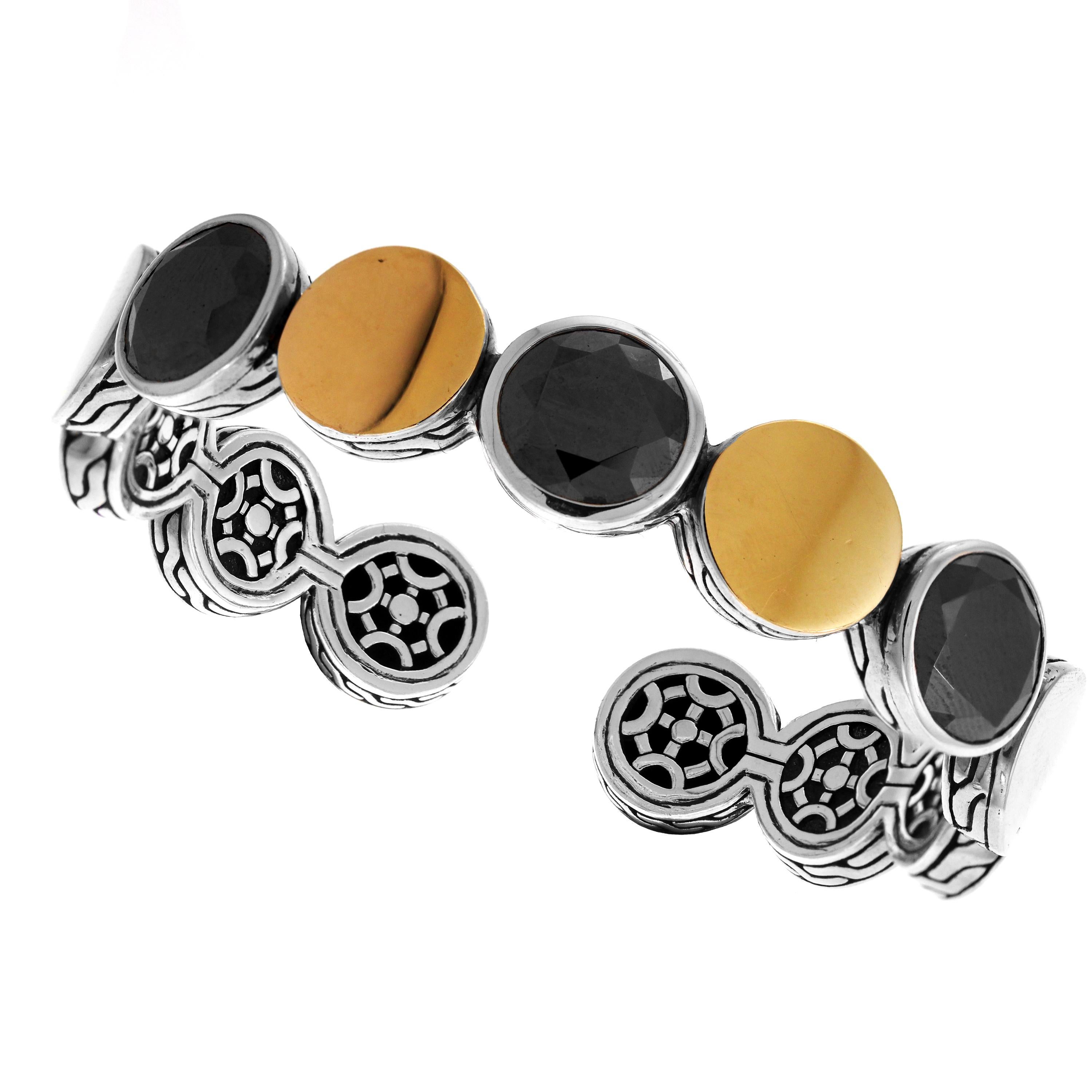 IF YOU ARE REALLY INTERESTED, CONTACT US WITH ANY REASONABLE OFFER. WE WILL TRY OUR BEST TO MAKE YOU HAPPY!

John Hardy Stackable 18K Yellow Gold and Sterling Silver Cuff Bracelet Set with Black Spinel

Bracelet measures 0.5 inch in width

Bracelet