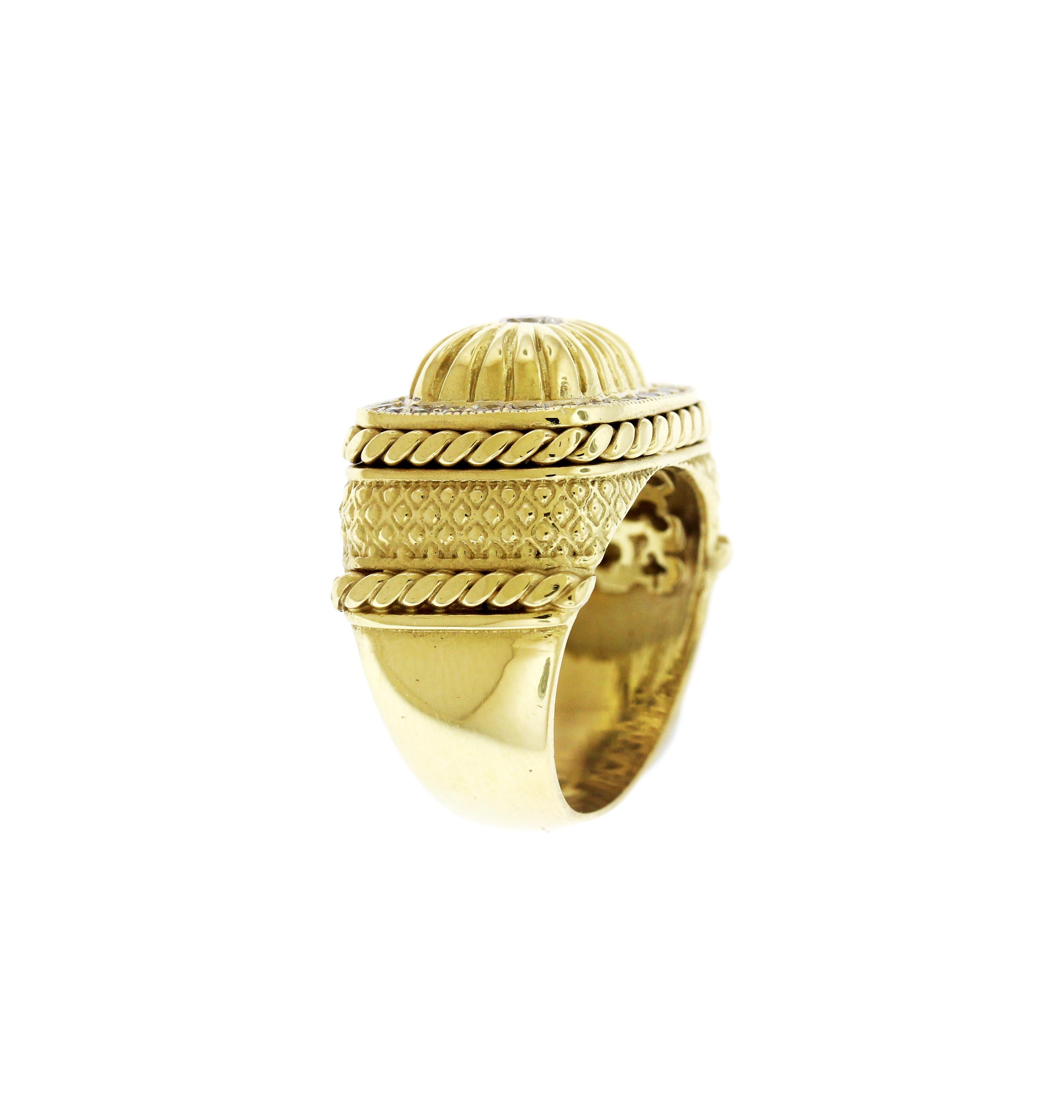 Stambolian 18K Yellow Gold and White Diamond Cocktail Ring

18K yellow gold dome face ring with twist and quilted design, surrounded by white diamonds.

0.47 carat G color, VS clarity diamonds

Ring face is 0.7 in. x 0.6 in., 0.5 band width

Size 6,