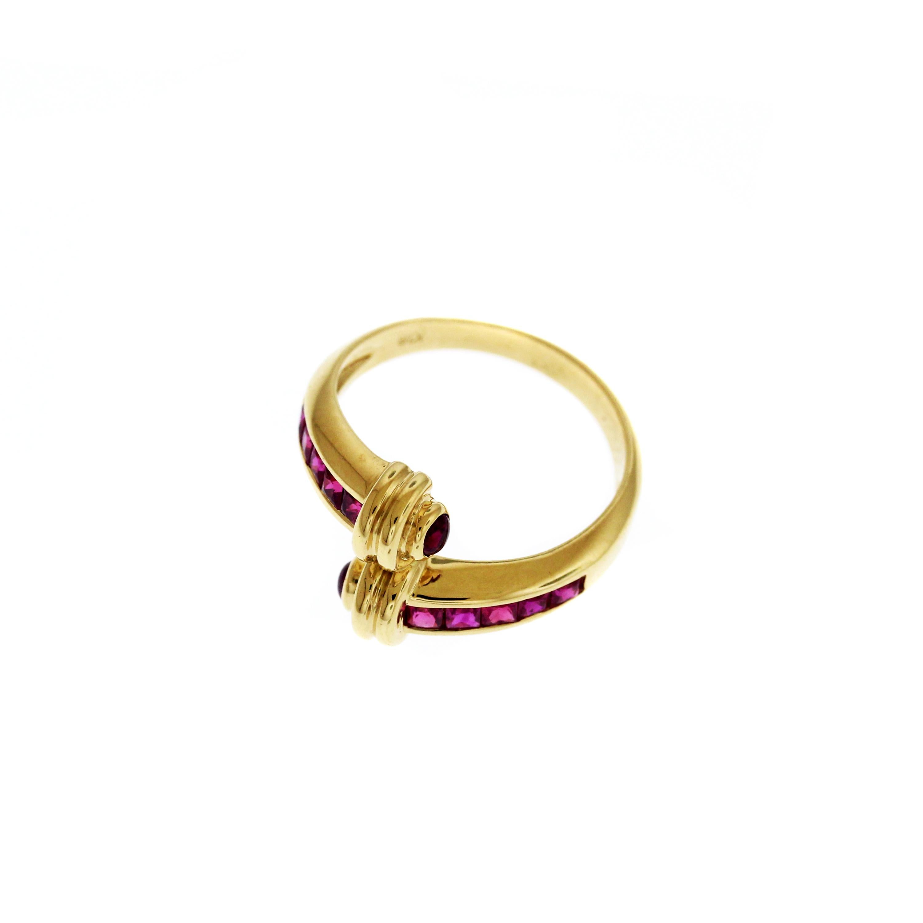 18K Yellow Gold Ring with Princess Cut Rubies and Cabochon Rounds

1 carat Rubies

Ring face is 0.5 inch wide

Size 5, sizable. 

Made in USA